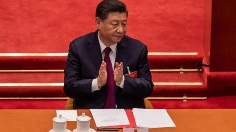 Le président chinois Xi Jinping exprimant l'espoir d'une coopération à Angela Merkel