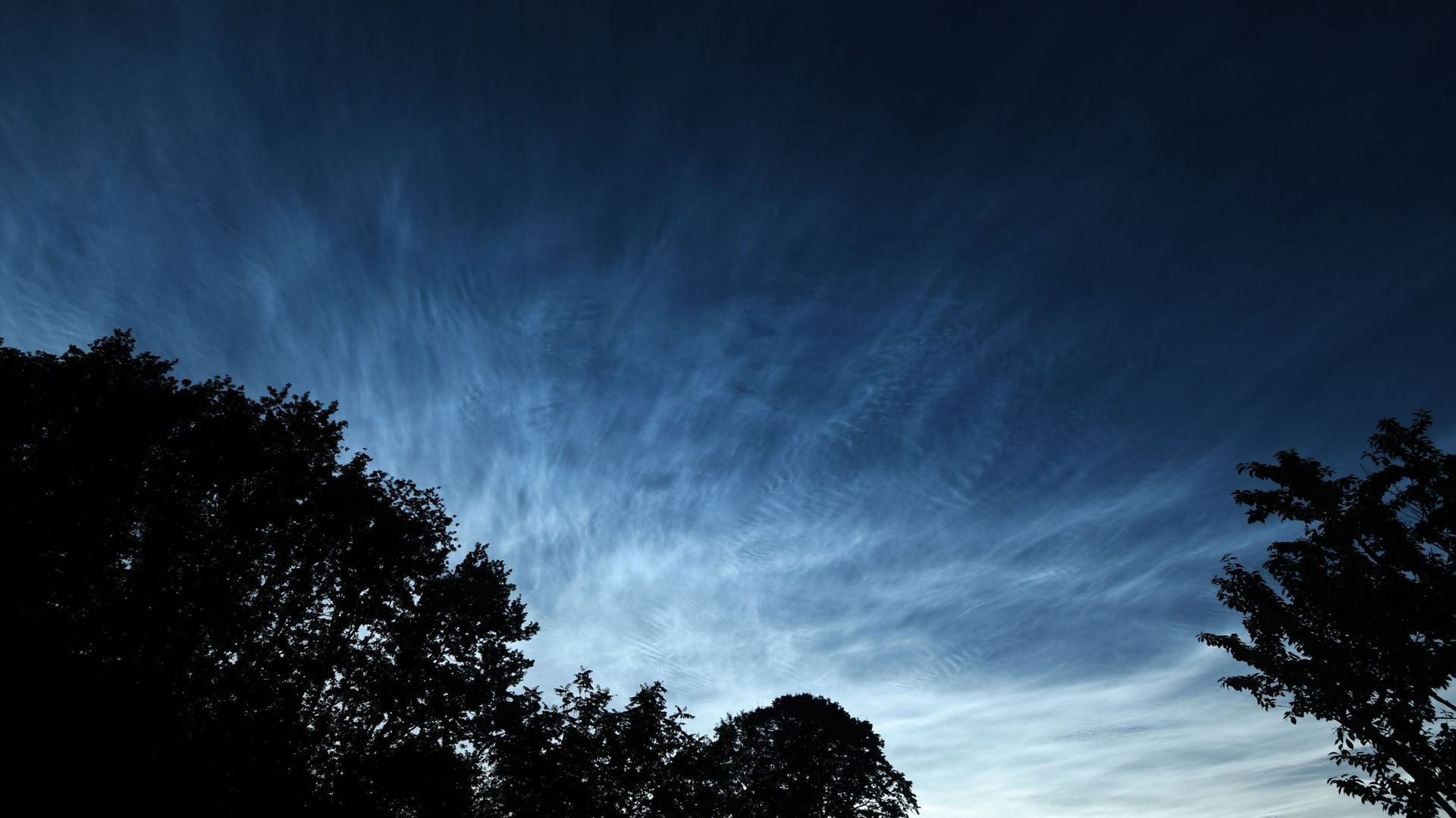 Noctilucent clouds at midnight