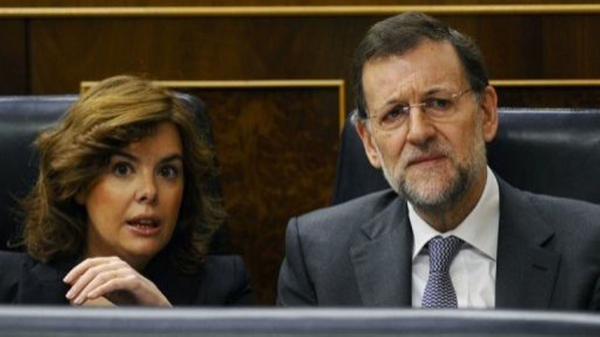 Le Premier ministre espagnol Mariano Rajoy et la porte-parole du gouvernement Soraya Saenz de Santamaria le 8 février 2012 à Madrid