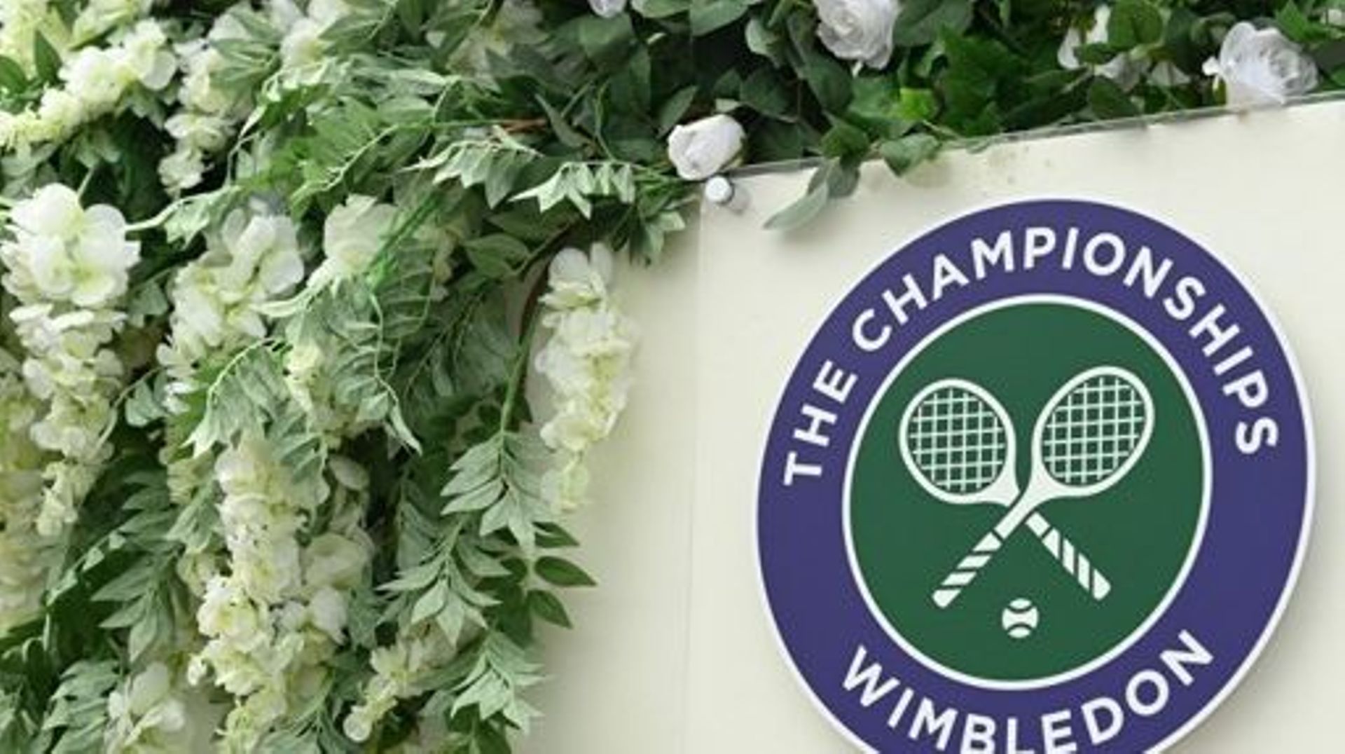 A logo is pictured on the fourth day of the 2021 Wimbledon Championships at The All England Tennis Club in Wimbledon, southwest London, on July 1, 2021.  Glyn KIRK / AFP