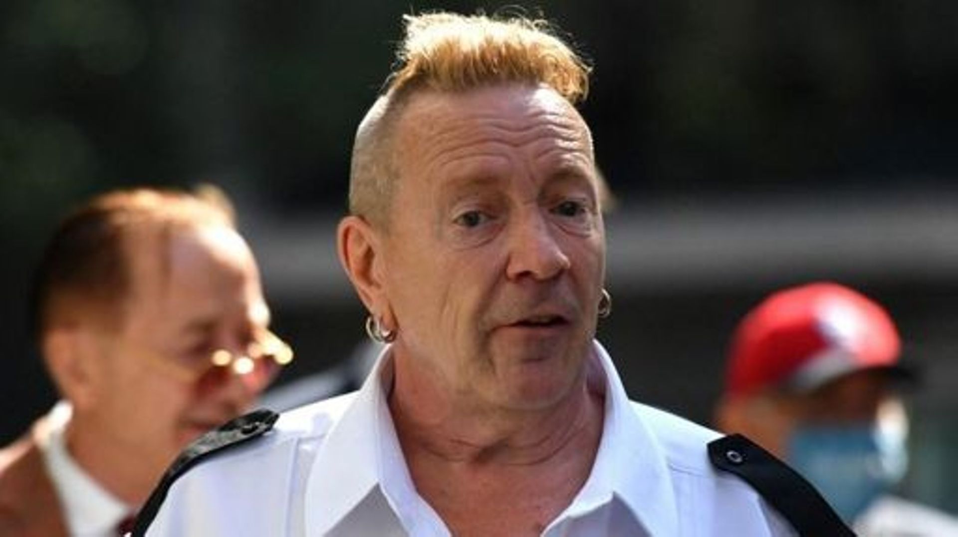 Sex Pistols frontman John Lydon, also known as Johnny Rotten arrives at the Rolls building in central London on July 22, 2021. Lydon is in court to fight two former Sex Pistols band members over the use of their songs in an upcoming television series. JUS