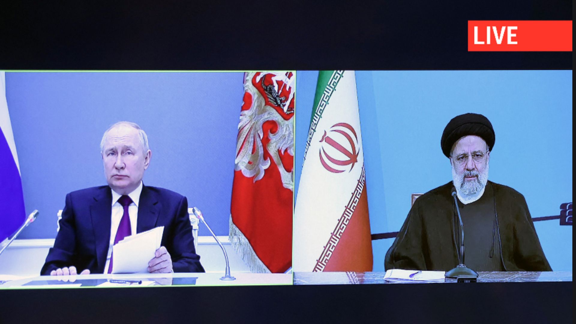 Le président iranien Ebrahim Raisi et le président russe Vladimir Poutine assistent par vidéoconférence à la signature d'un accord pour la construction de la dernière partie du corridor international de transport nord-sud (INSTC) qui relie la Russie au Go