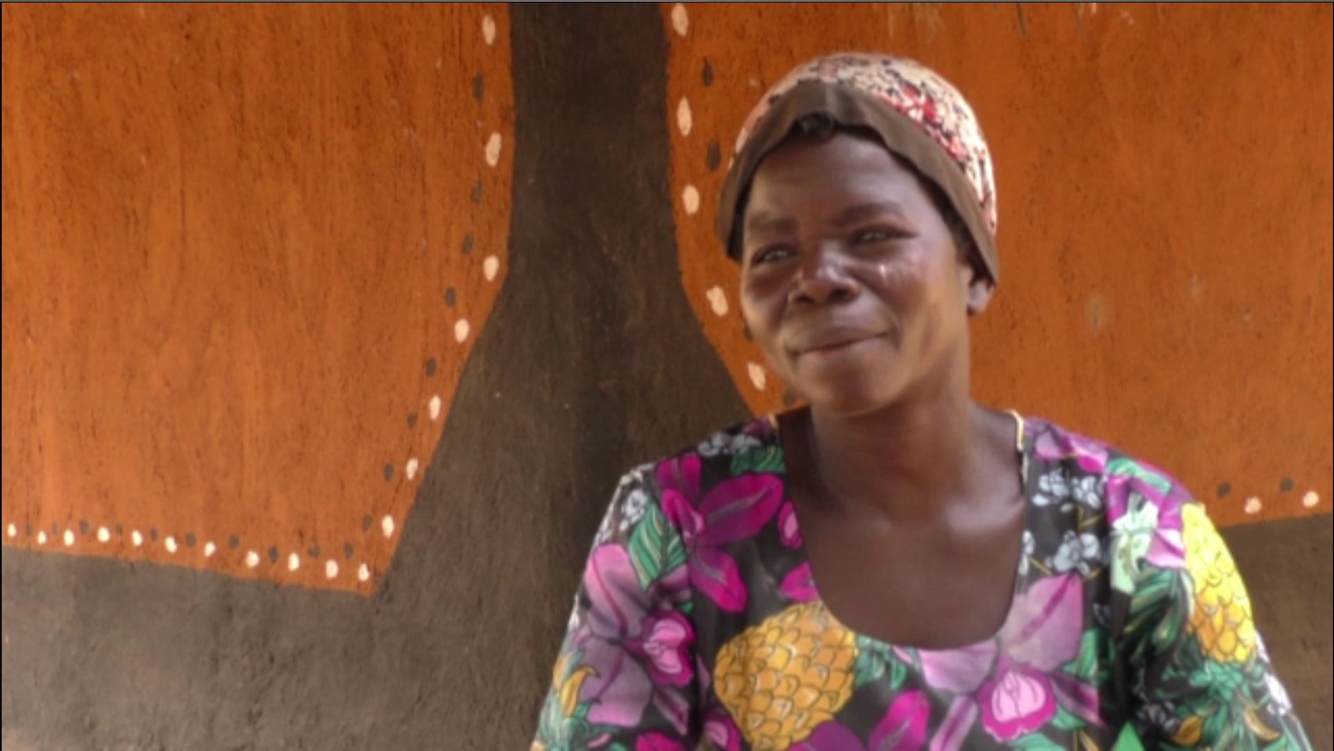 Stella Afoyocan, agricultrice, fait partie des personnes affectées par le projet Tilenga