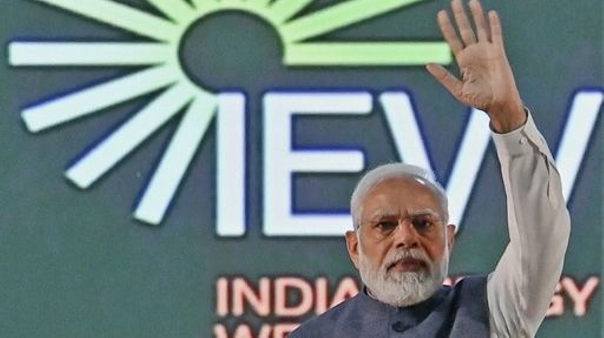 India’s Prime Minister Narendra Modi waves at the crowd during the inauguration of 'India Energy Week 2023' under India’s G20 Presidency, in Bengaluru on February 6, 2023. Manjunath KIRAN / AFP