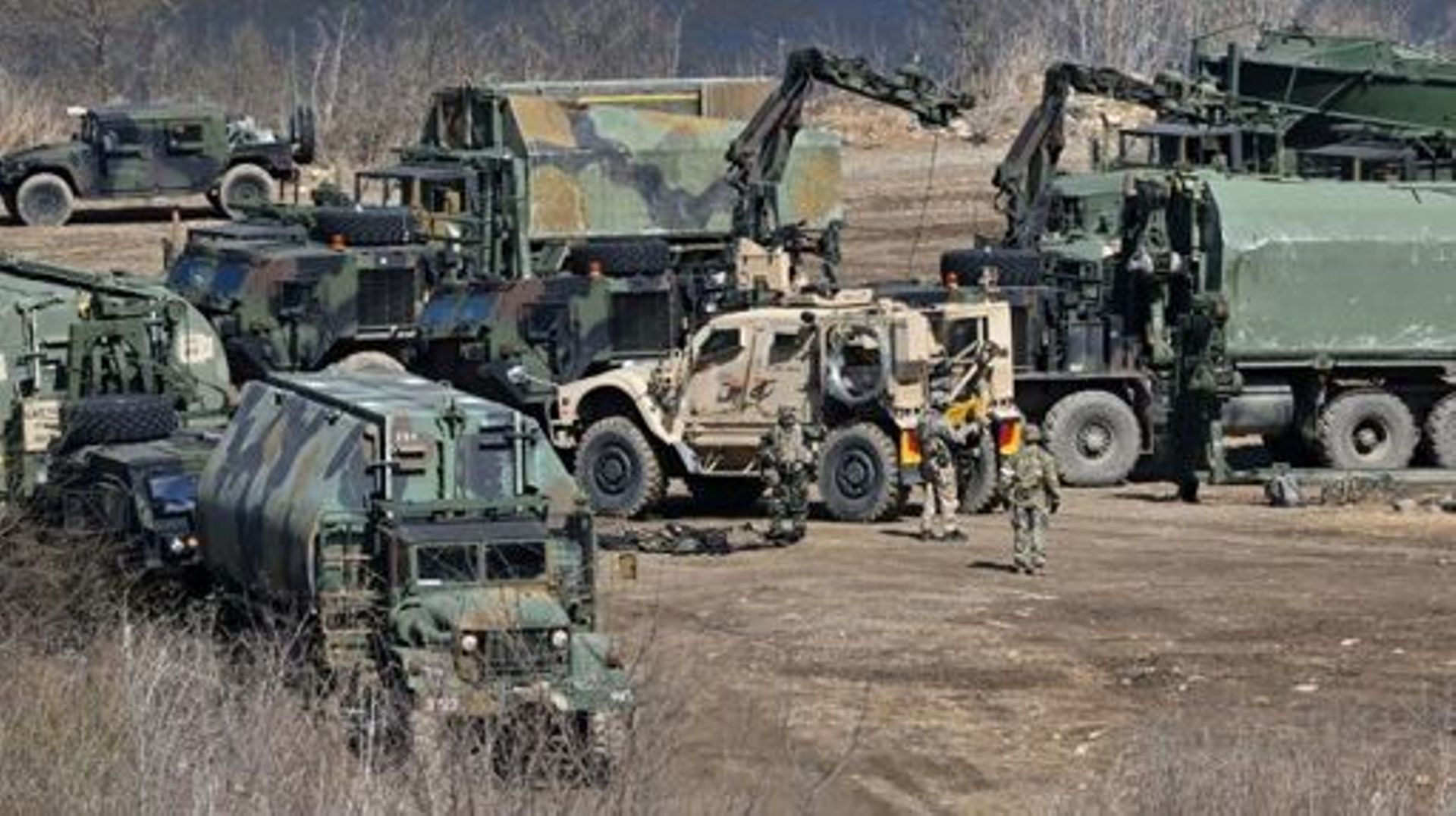 South Korean and US military vehicles are seen at a military training field in the border city of Yeoncheon on March 13, 2023. South Korea and the United States kicked off the Freedom Shield joint military exercise, their largest drills in five years, whi
