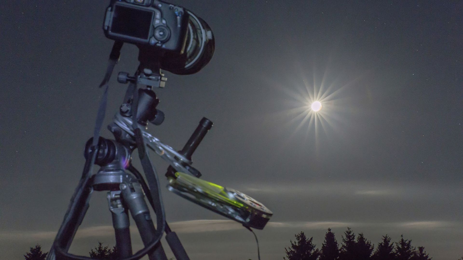 Germany, Hesse, Hochtaunuskreis, Equipment used for astro photography, photographing a full moon eclipse