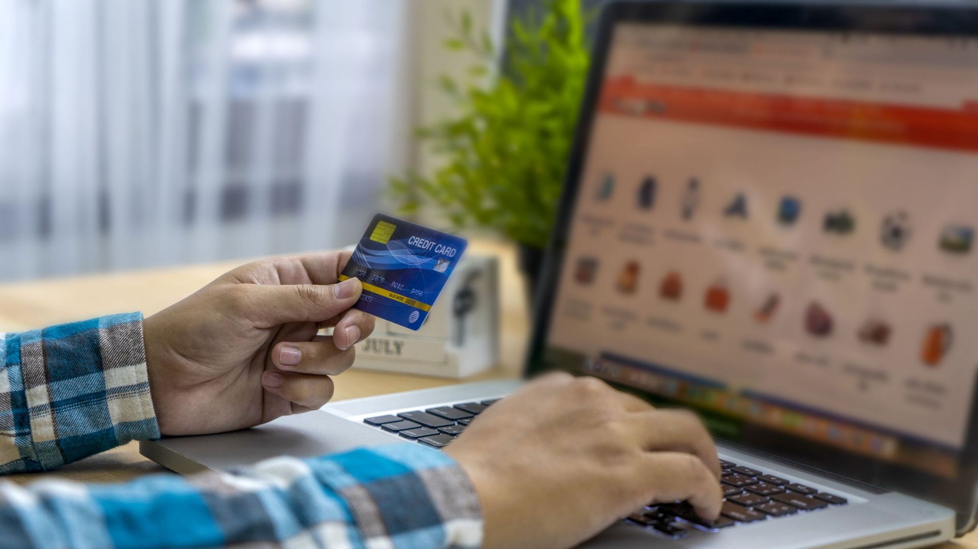 Online payment, Man&#39 ; s hands holding a credit card and using smart phone for online shopping