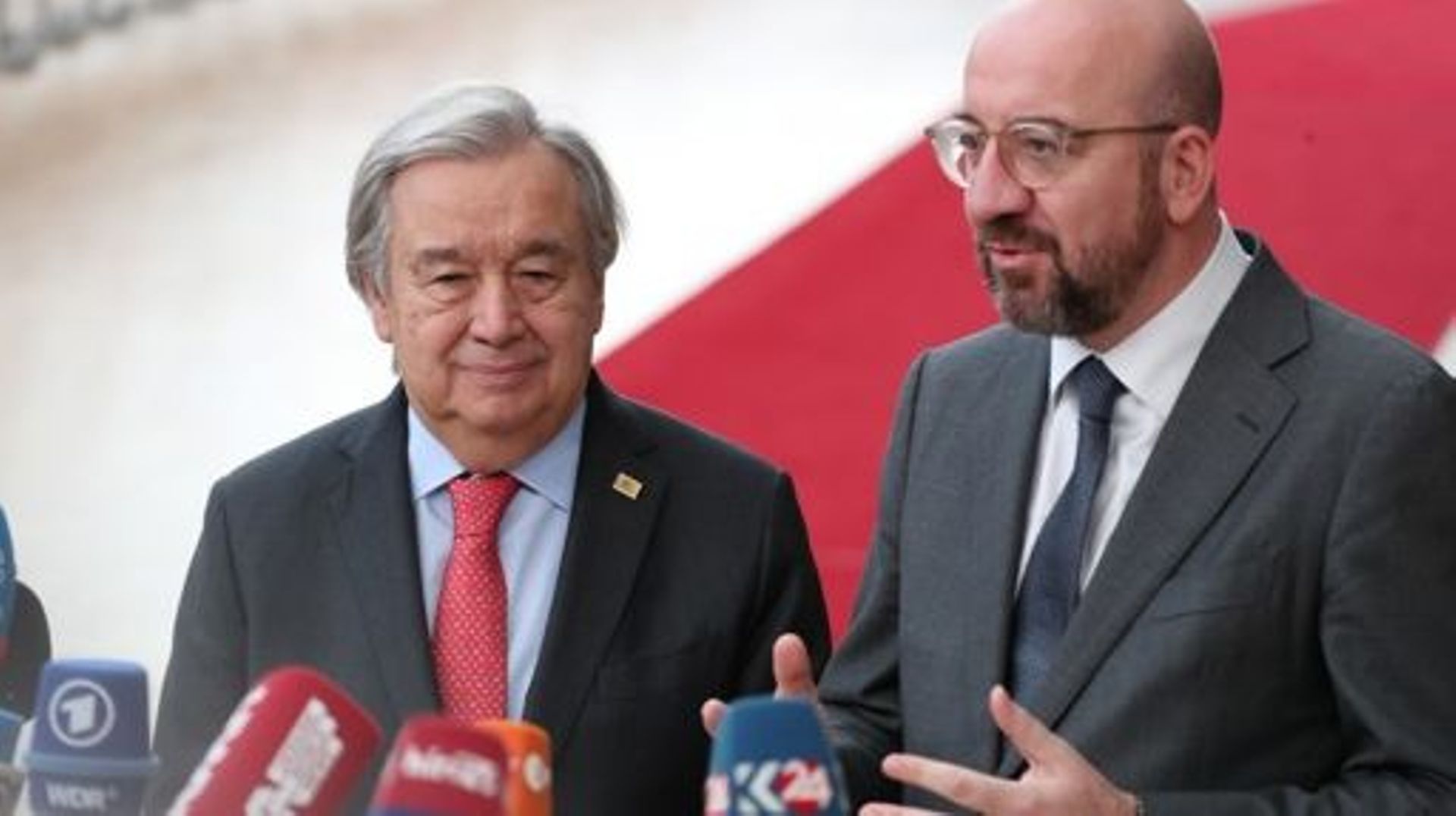 UN Secretary-General Antonio Guterres and European Council President Charles Michel pictured at the arrivals ahead of a European council summit, in Brussels, Thursday 23 March 2023. BELGA PHOTO NICOLAS MAETERLINCK