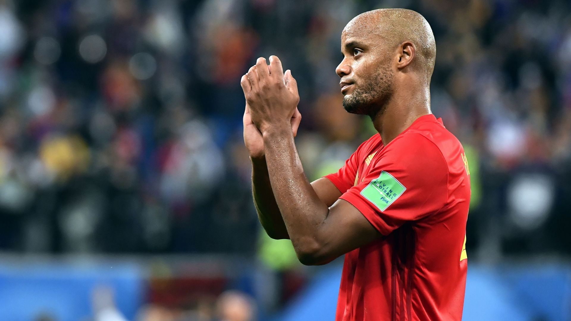 Vincent Kompany shows deception after they lost the semi final match between the French national soccer team