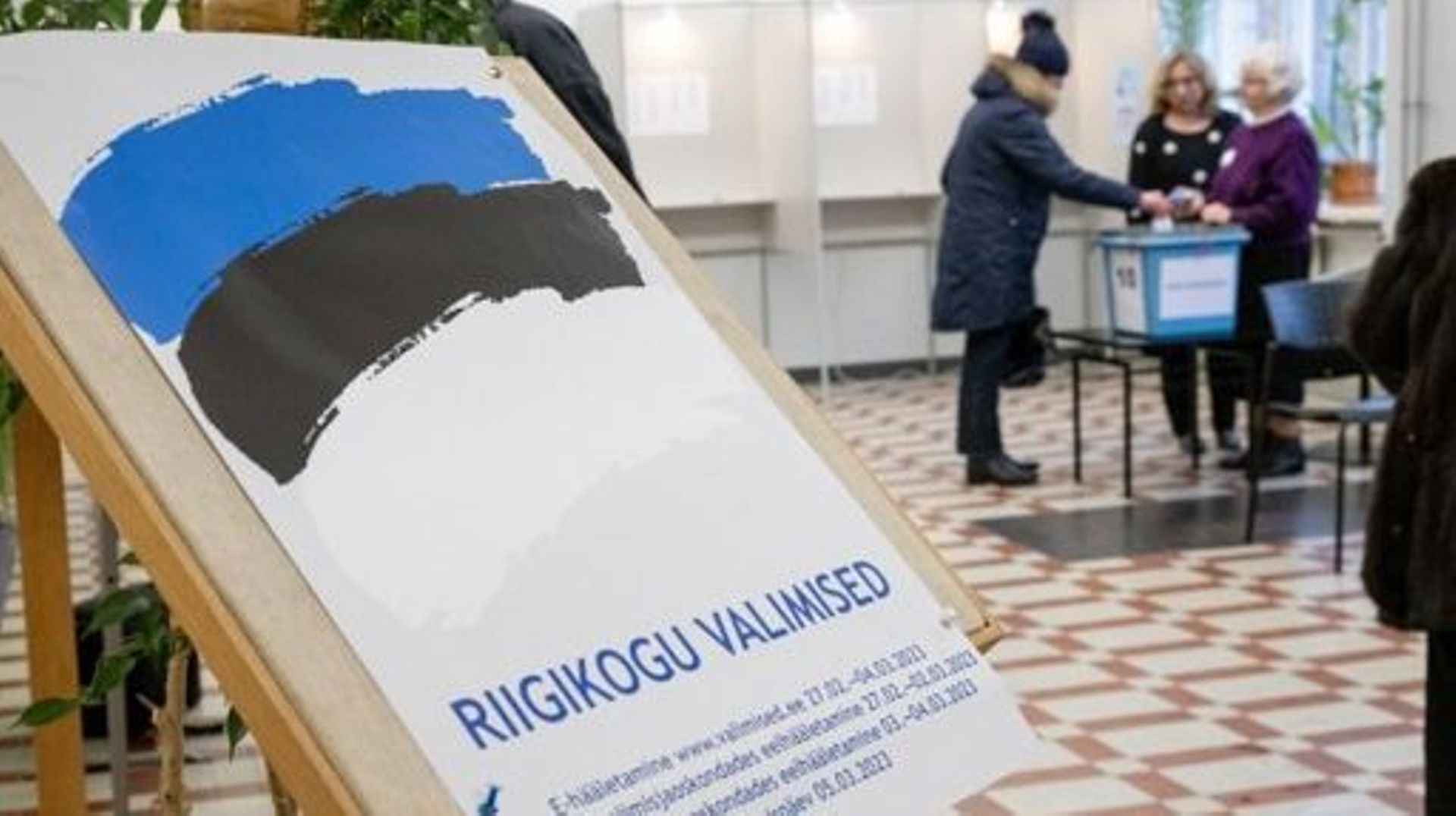 A man cast his vote at a polling station at the University of Tallinn, Estonia on March 5, 2023 during parliamentary elections. According to the polls, the elections are set to be won by the Reform Party of Prime Minister Kaja Kallas, who has led internat