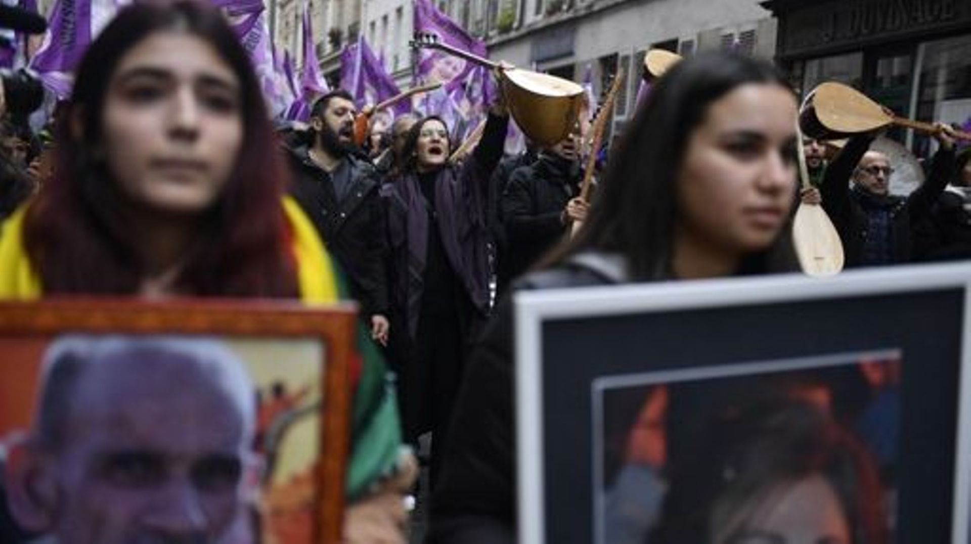 Demonstrators take part in a march in solidarity with the Kurdish community and to pay tribute to the victims of the Enghien Street shooting in Paris on December 26, 2022. A 69-year-old French man suspected of killing three Kurds and injuring three others