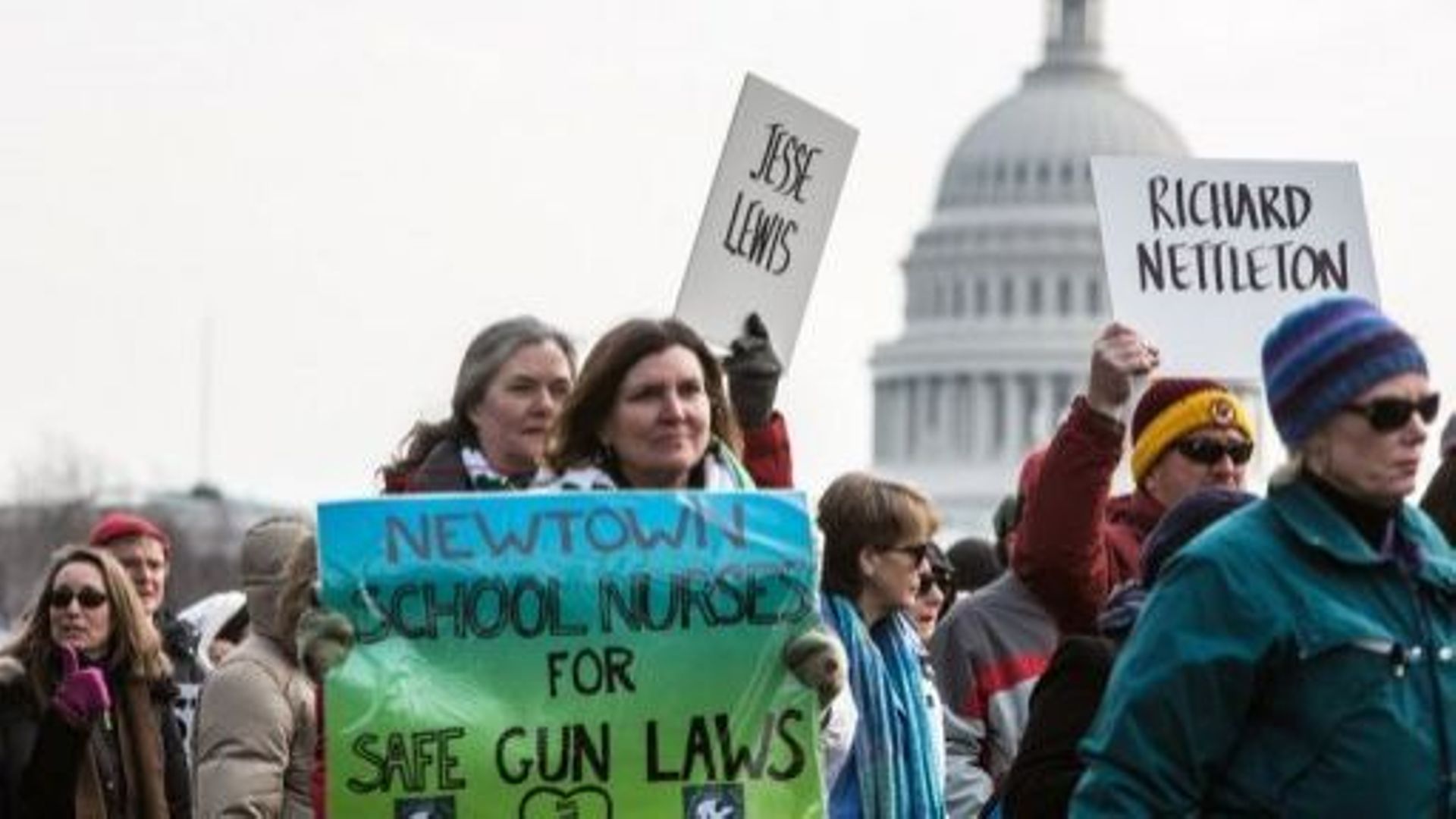Des manifestants exigent un renforcement de la législation sur les armes à feu, le 26 janvier 2013 à Washington