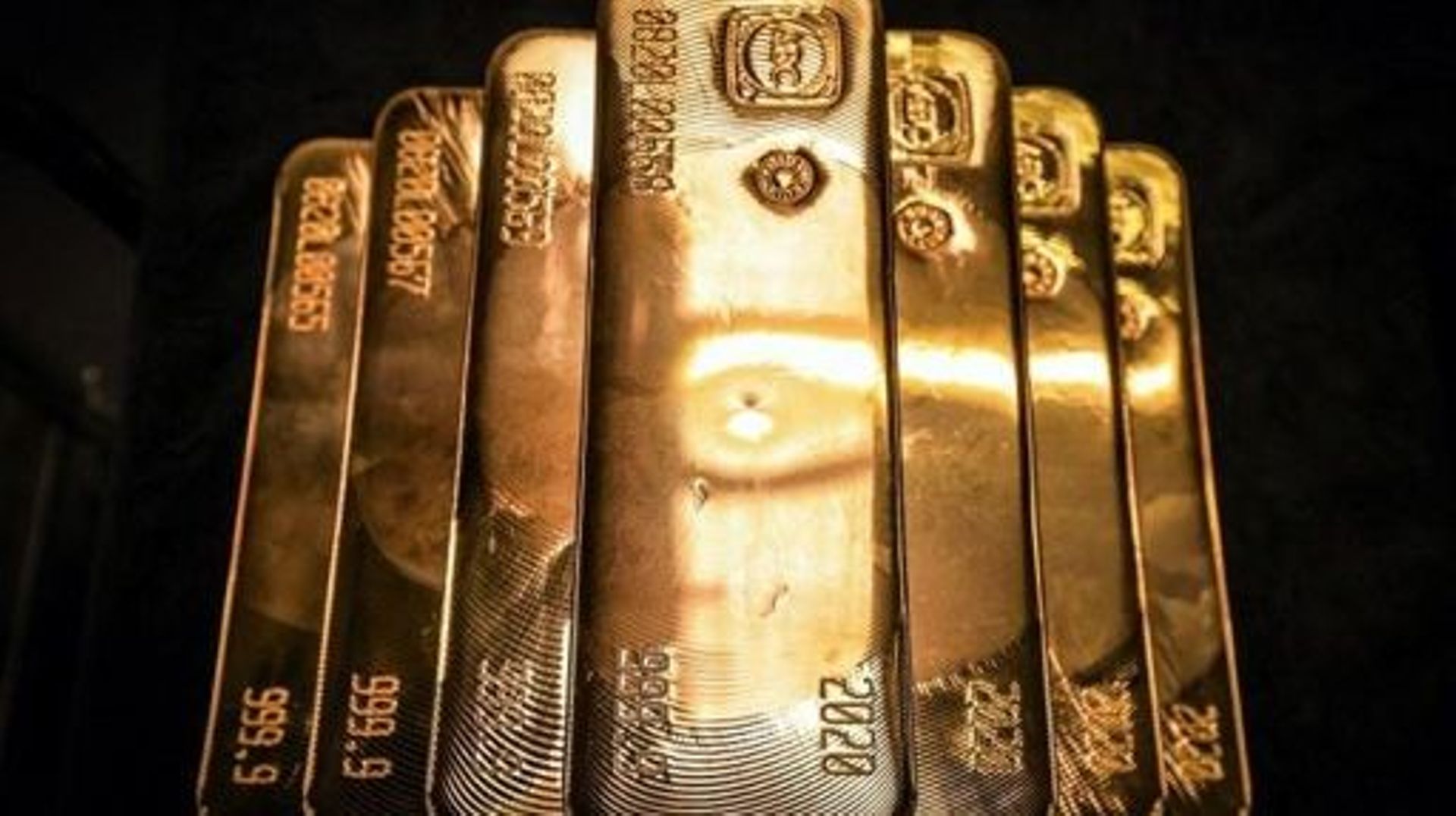 Gold bullion bars are pictured after being inspected and polished at the ABC Refinery in Sydney on August 5, 2020. Gold prices hit 2,000 USD an ounce on markets for the first time on August 4, the latest surge in a commodity seen as a refuge amid economic