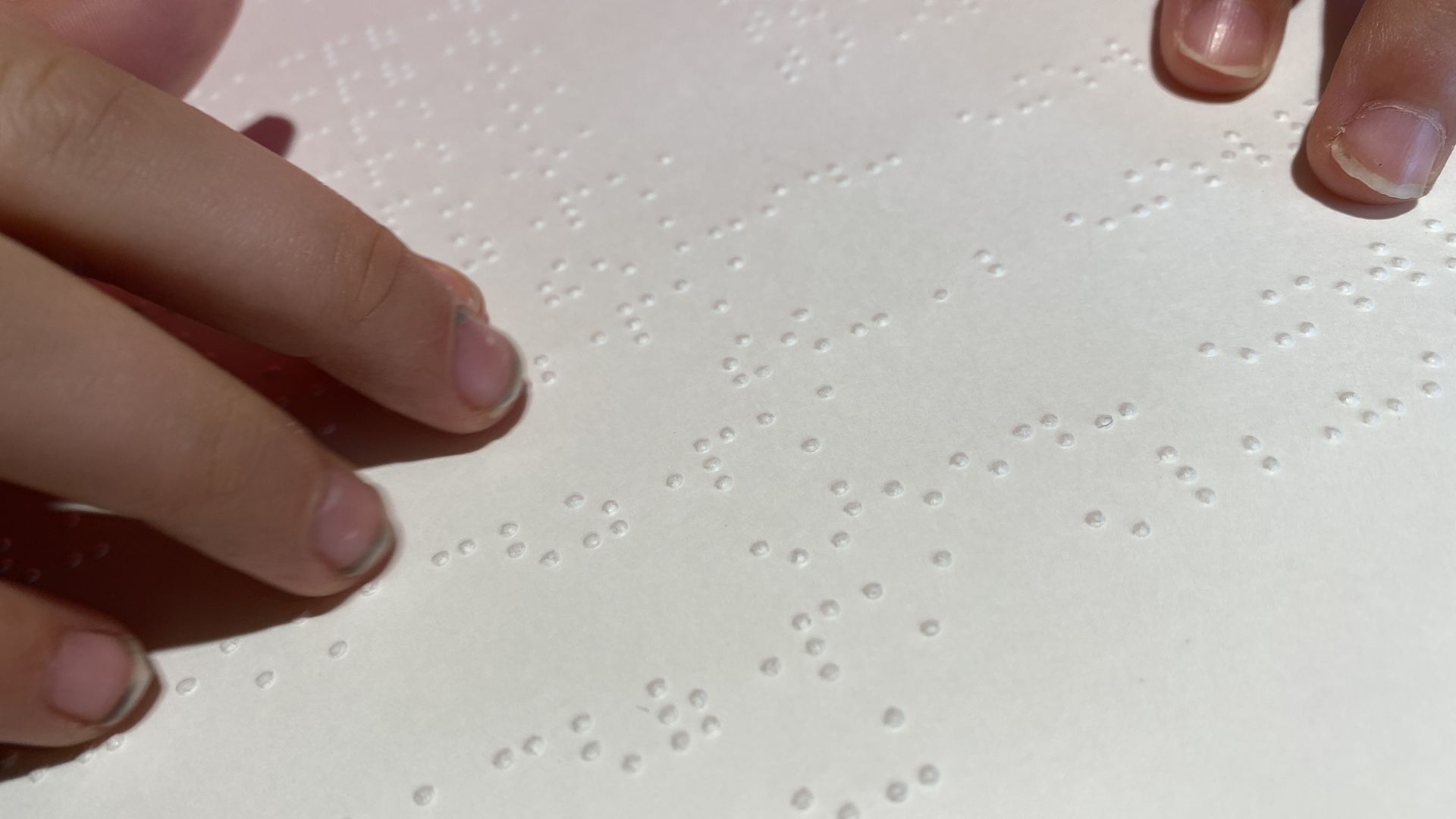 Braille, a basic tool, is rarely used in public places