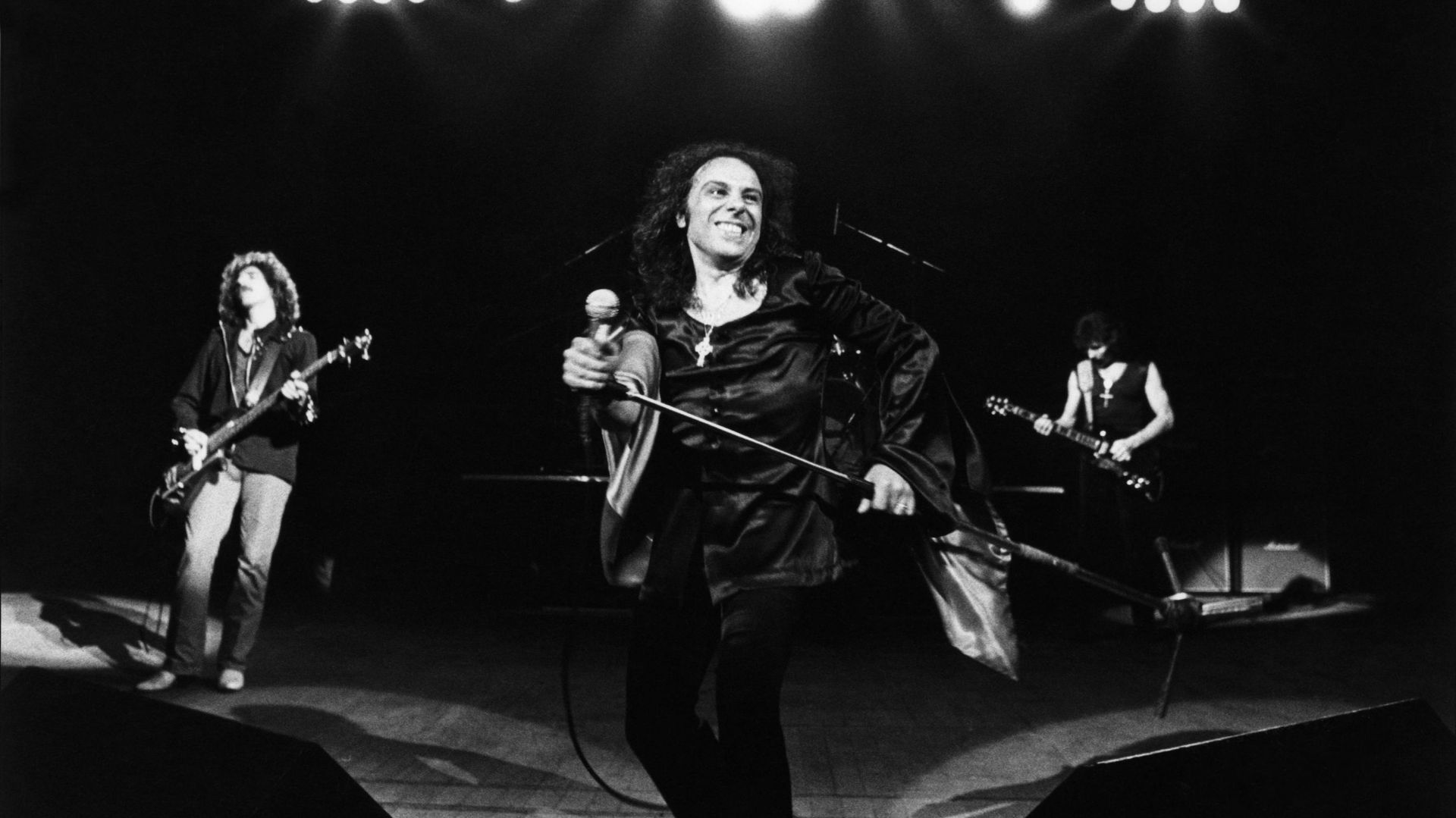 UNITED KINGDOM - JUNE 25: Photo of Tony IOMMI and Geezer BUTLER and Ronnie DIO and BLACK SABBATH; L-R: Geezer Butler, Ronnie Dio, Tony Iommi performing live onstage (Photo by Fin Costello/Redferns)