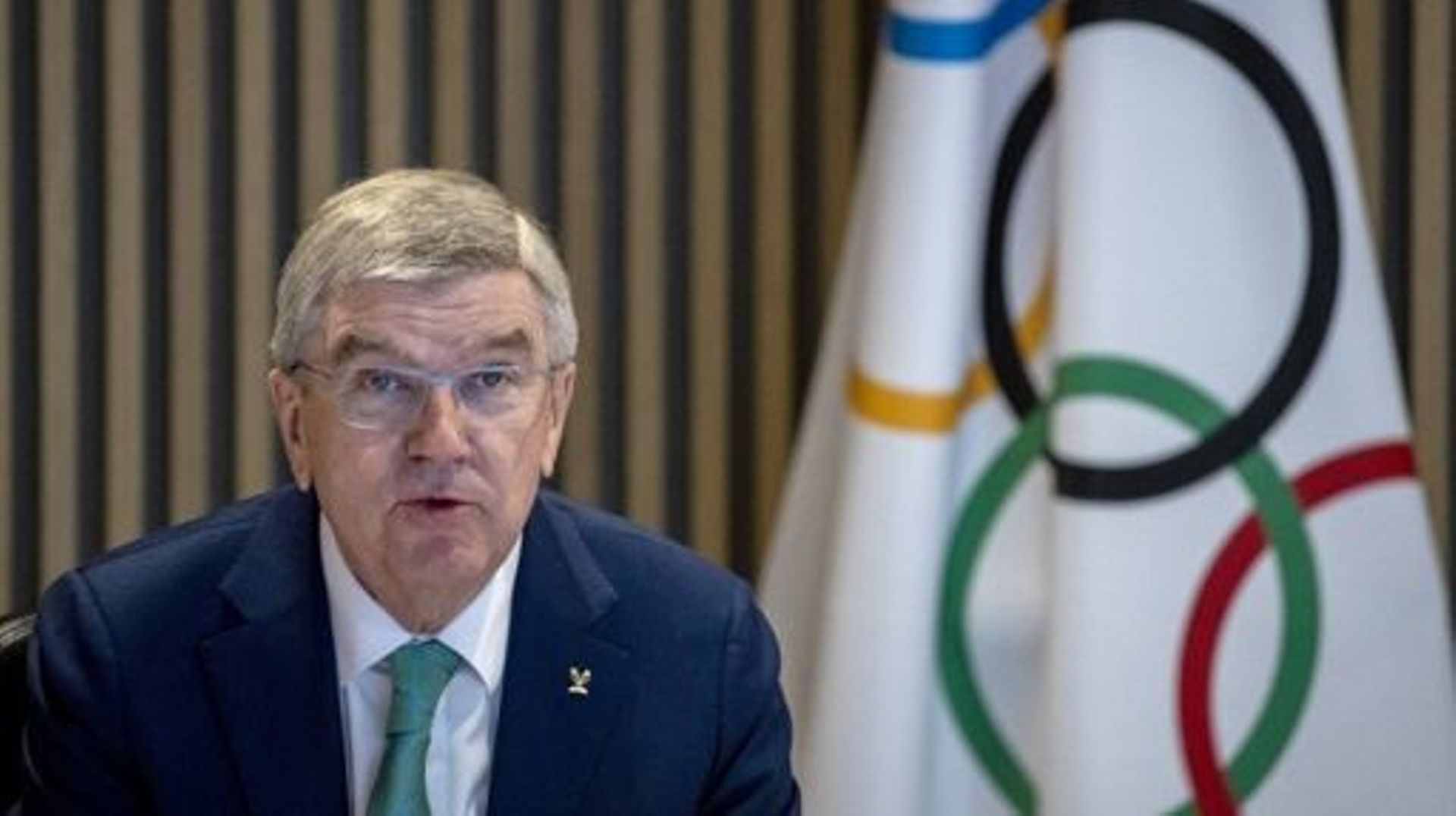 International Olympic Committee (IOC) President Thomas Bach speaks at the start of the IOC Executive Board meeting at the Olympic House in Lausanne, Switzerland on December 5, 2022.  DENIS BALIBOUSE / POOL / AFP