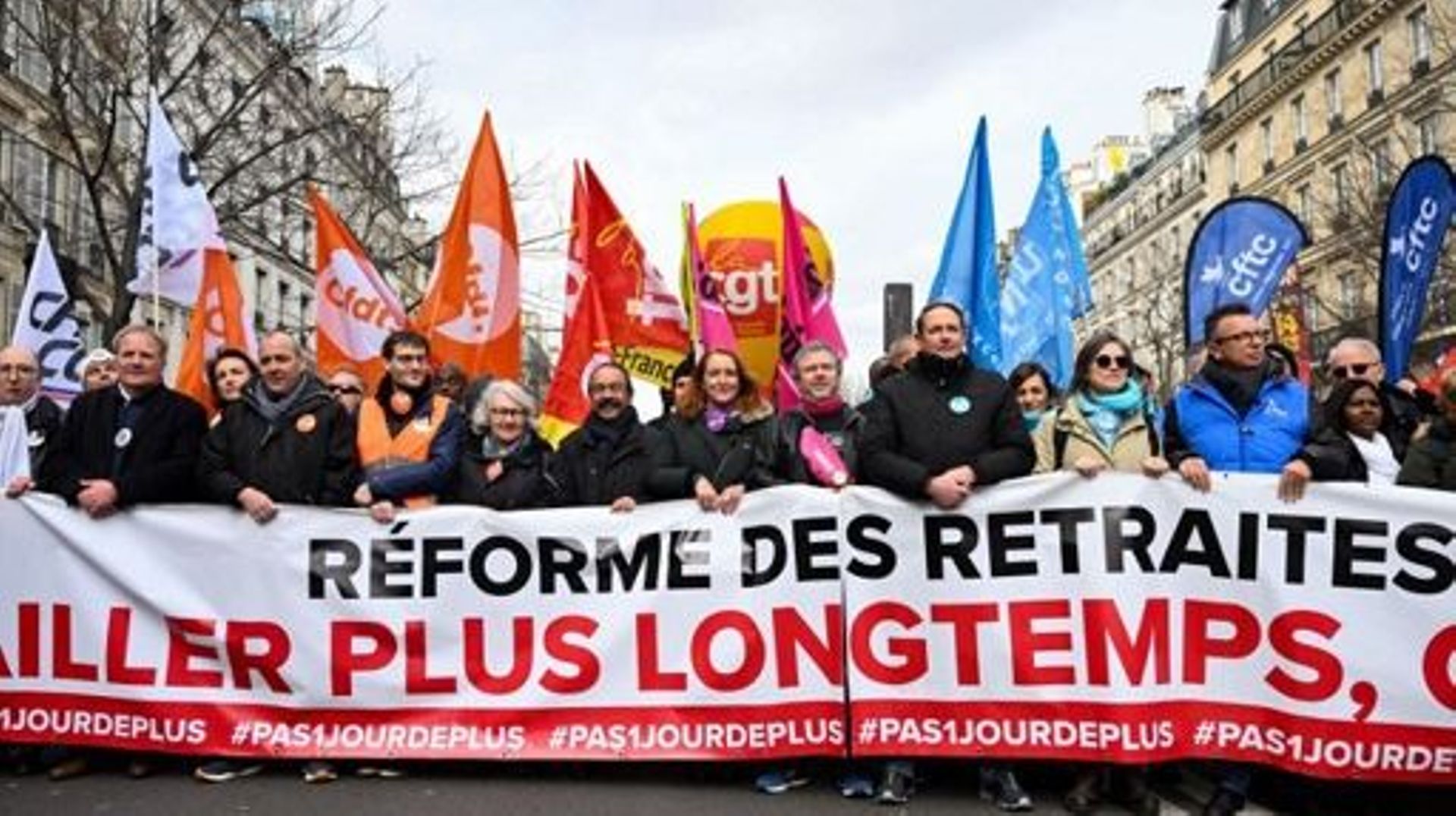 Les principaux dirigeants de syndicats français (CFDT, CGC, CFE) réunis lors d’une manifestation le 11 mars à Paris.