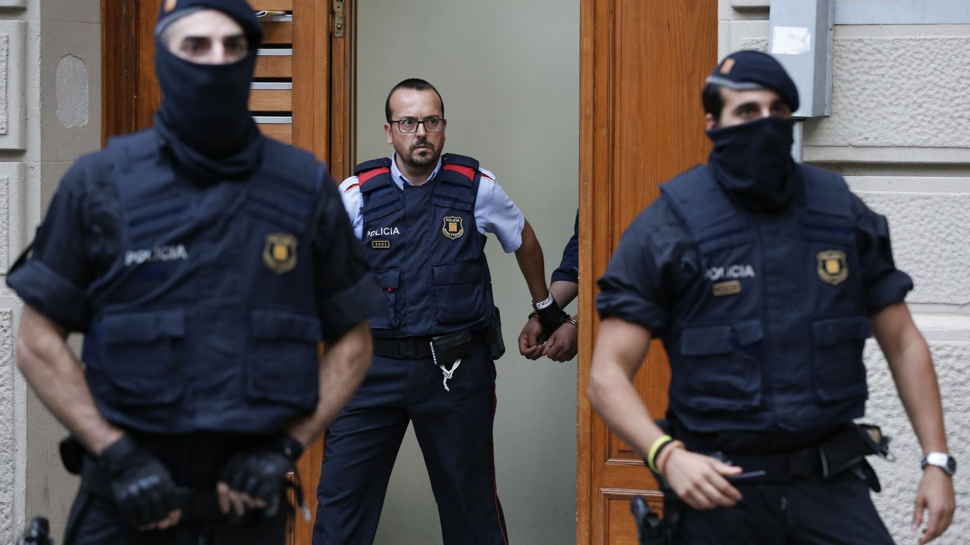 Attentats en Espagne: la police sur la piste d'une cellule d'une douzaine de personnes