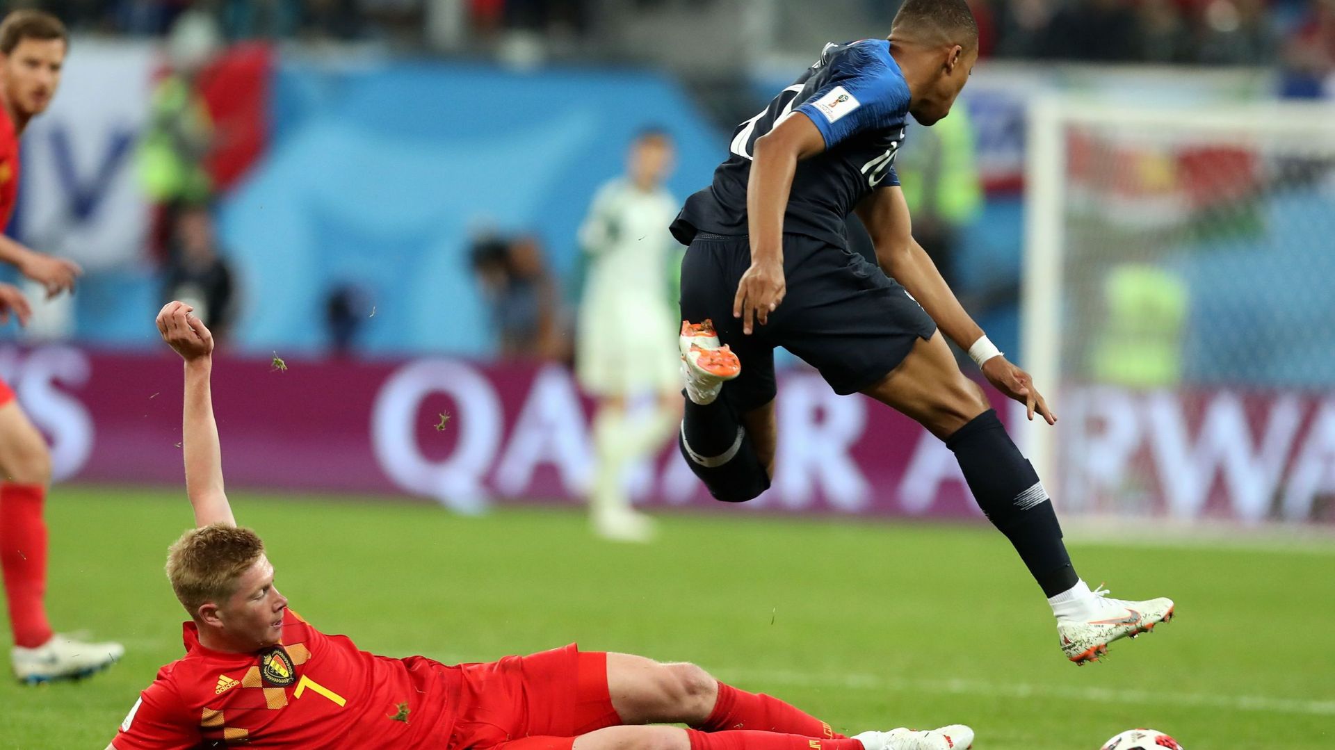 Kevin De Bruyne and France&#39;s Kylian Mbappe pictured in action during the semi final match between the French national soccer team 
