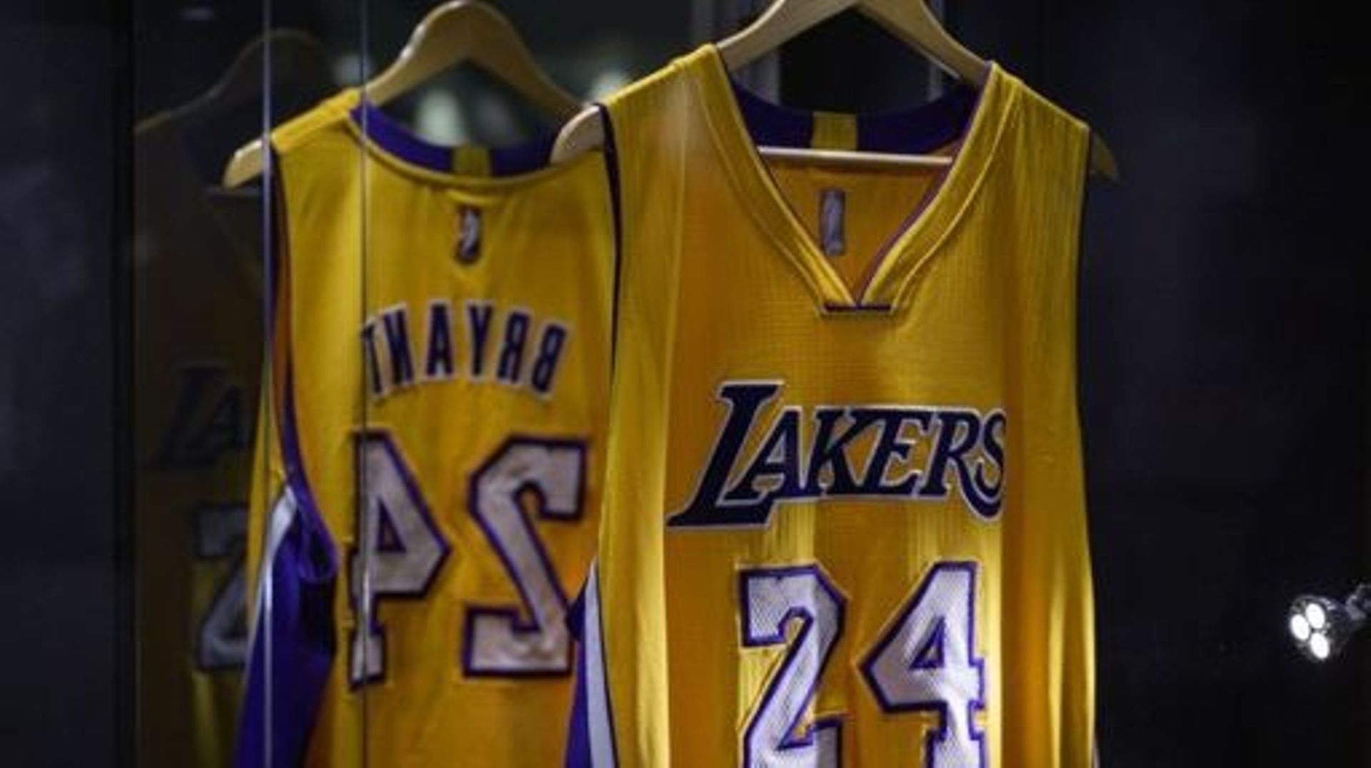 The jersey worn by US basketball player Kobe Bryant during his final NBA opening day (2015-2016 Season) is displayed as part of Sotheby's 'Invictus' sales in New York City on September 6, 2022.   ANGELA WEISS / AFP