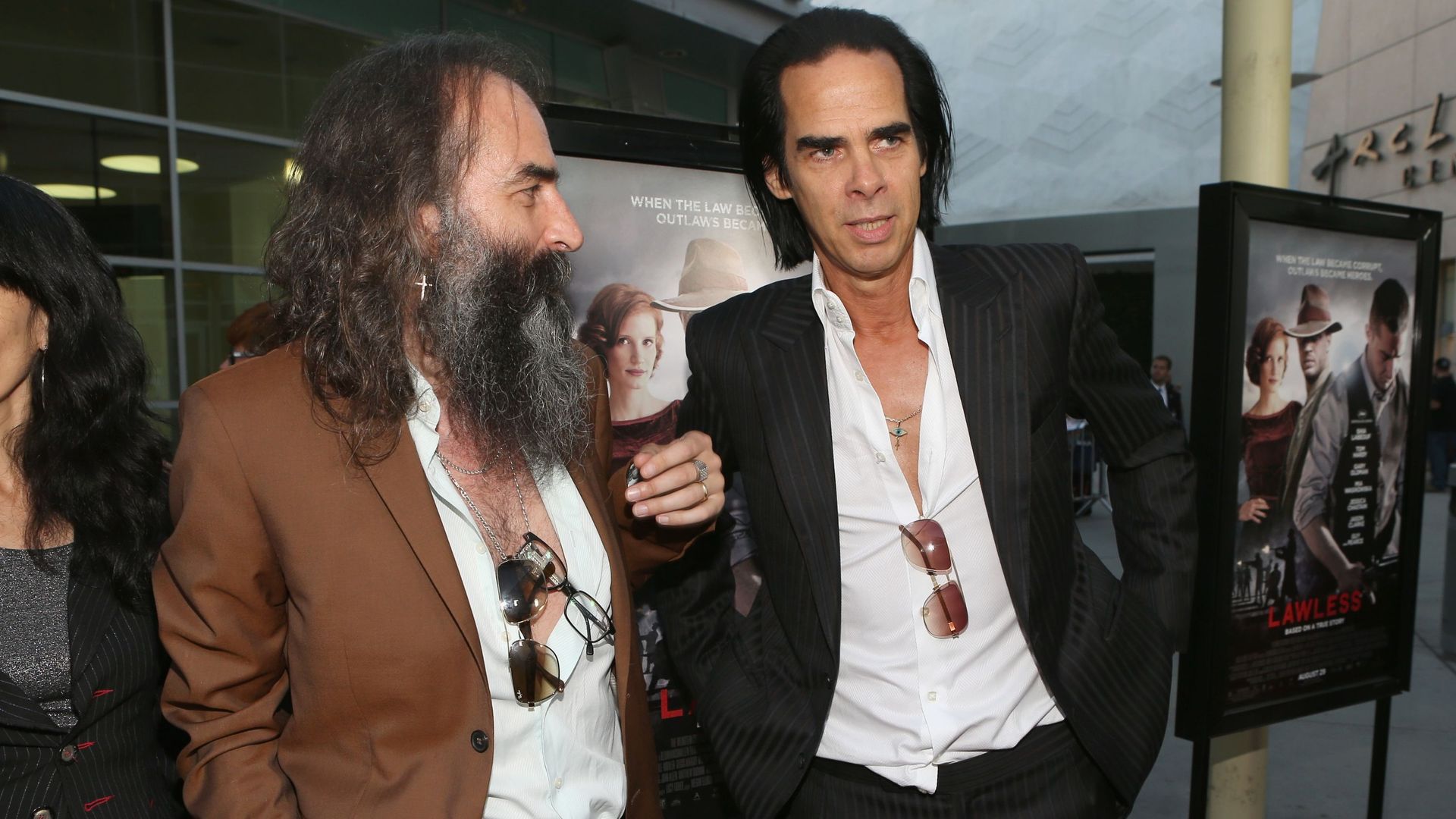 HOLLYWOOD, CA – AUGUST 22 : Screenwriter/composer Nick Cave, (R) and composer Warren Ellis arrive at the premiere of The Weinstein Company’s "Lawless" held at ArcLight Cinemas on August 22, 2012 in Hollywood, California. (Photo by Christopher Polk/Getty I