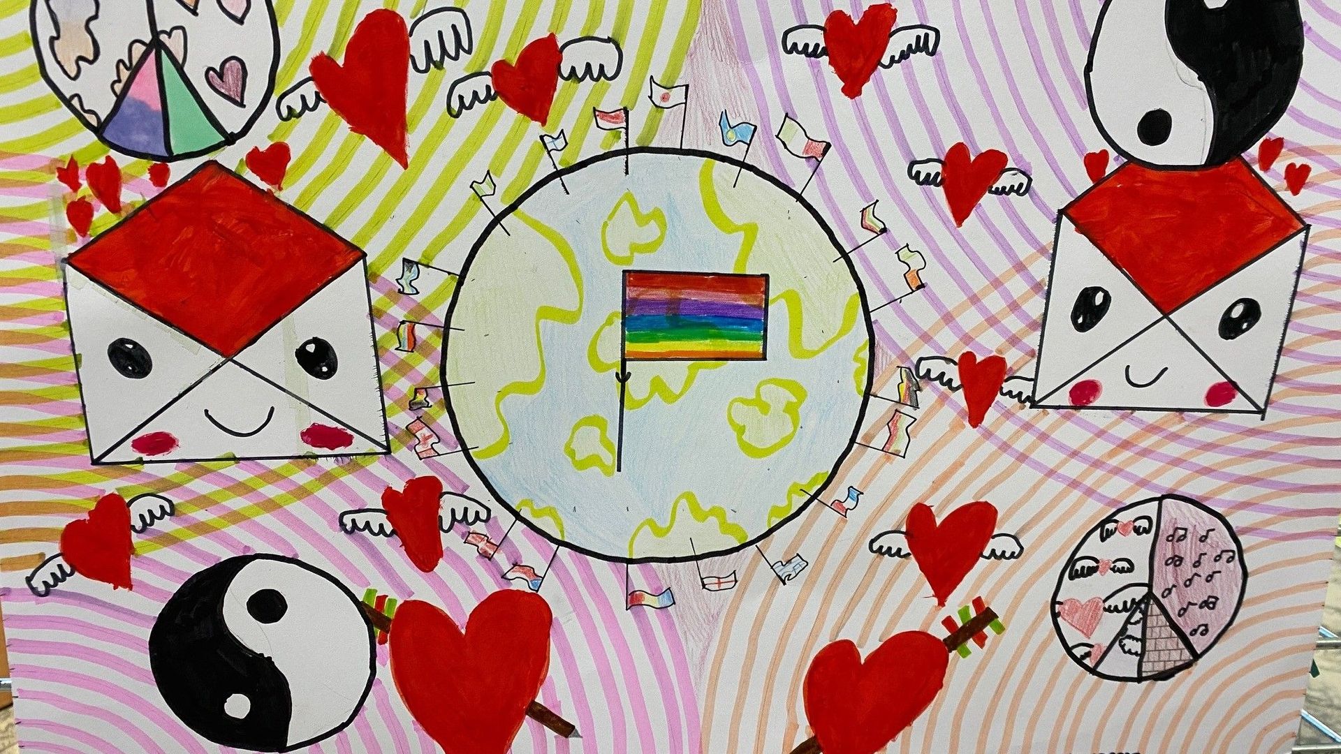 L'affiche de Camille, son drapeau arc-en-ciel et ce rouge, symbole d'amour