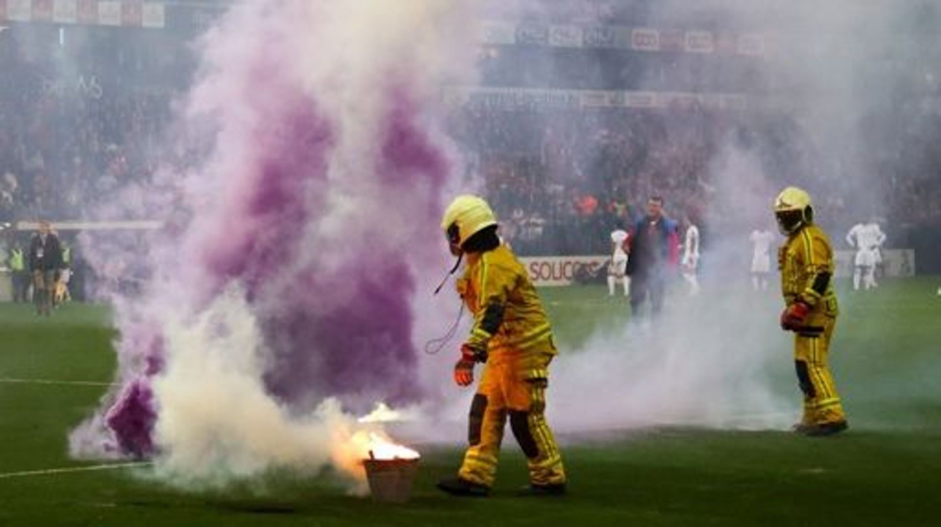Fire fighters pictured during a soccer match between Standard de Liege and RSC Anderlecht, Sunday 23 October 2022 in Liege, on day 14 of the 2022-2023 'Jupiler Pro League' first division of the Belgian championship. BELGA PHOTO VIRGINIE LEFOUR