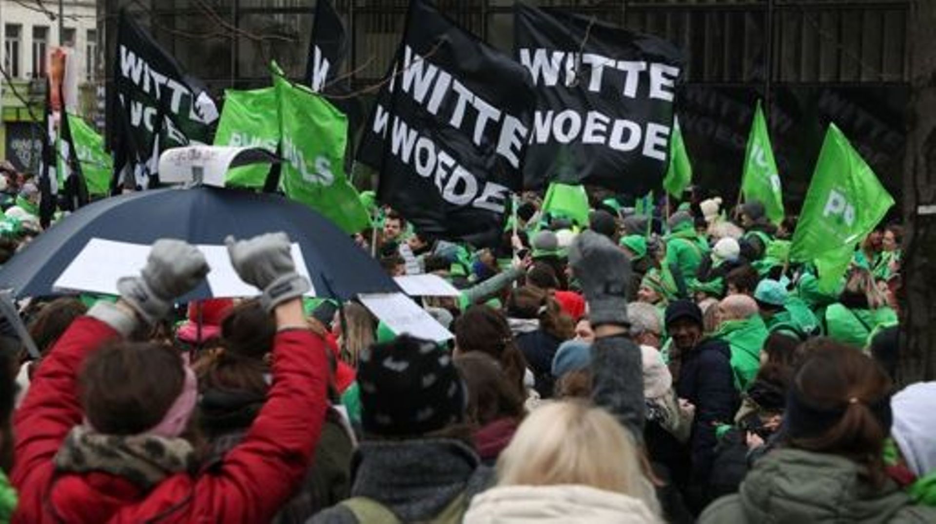 CSC - ACV union demonstrators in green pictured at a protest action of the trade unions of the non-profit sector in Brussels, Tuesday 31 January 2023. BELGA PHOTO NICOLAS MAETERLINCK