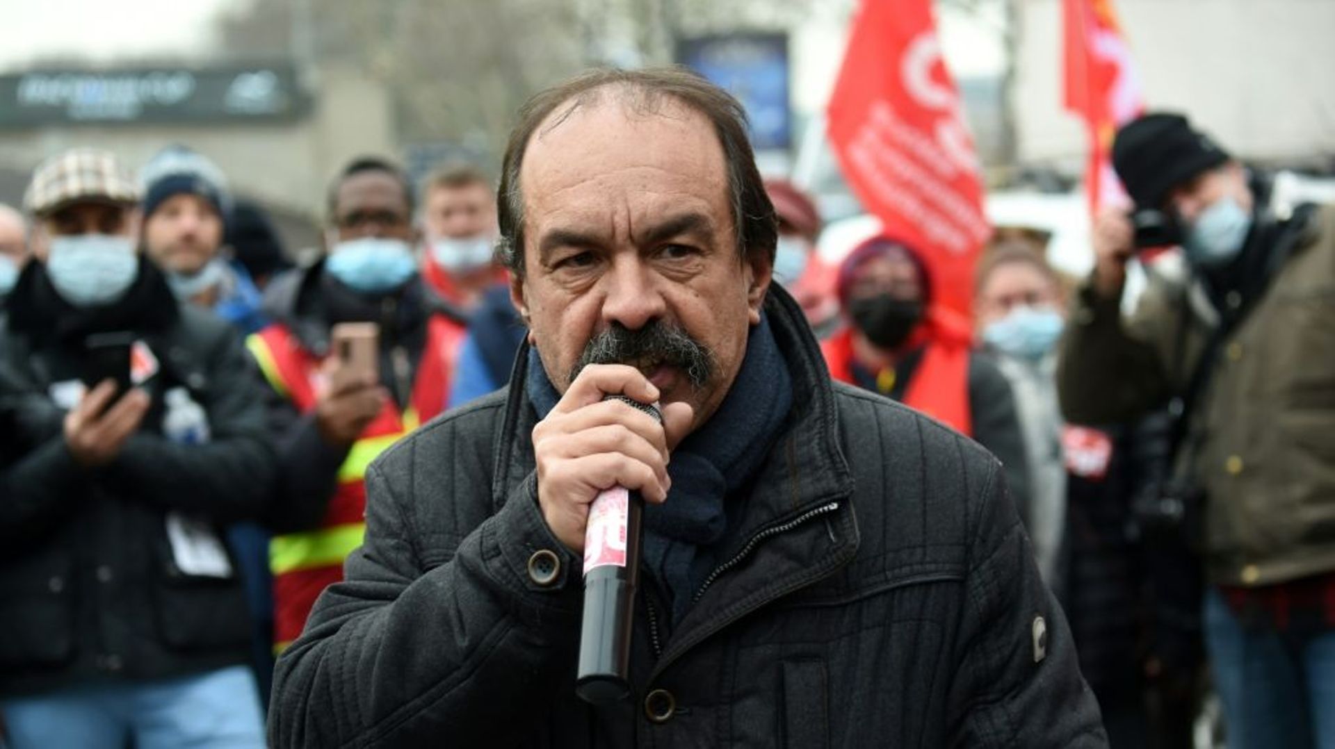 Le secrétaire général de la CGT Philippe Martinez lors d’une manifestation contre la fermeture de l’usine SAM le 12 janvier 2022 à Paris