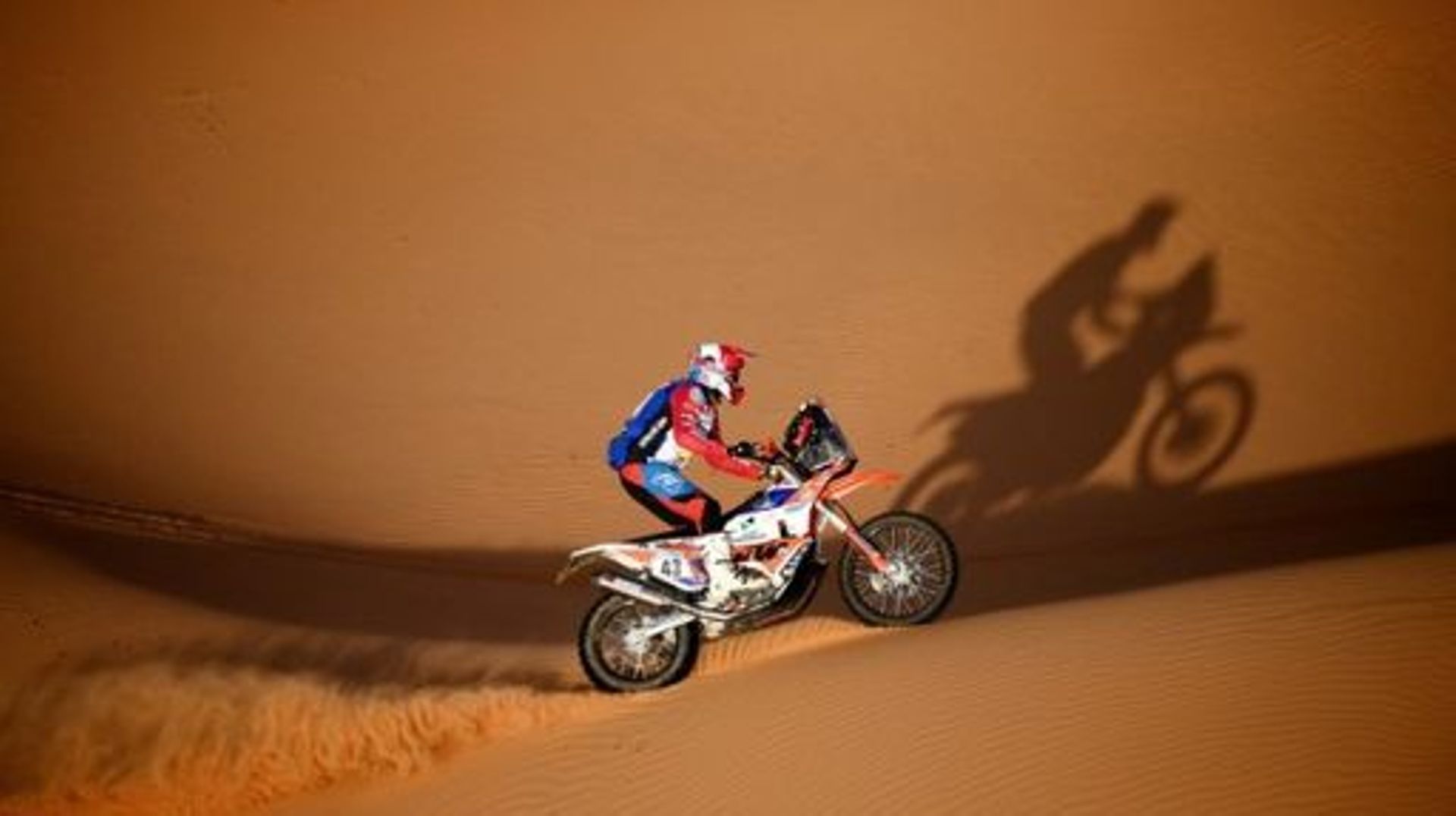 US biker Mason Klein competes during Stage 7 of the Dakar Rally 2022 between the Saudi capital Riyadh and al-Dawadimi town, on January 9, 2022.  FRANCK FIFE / AFP