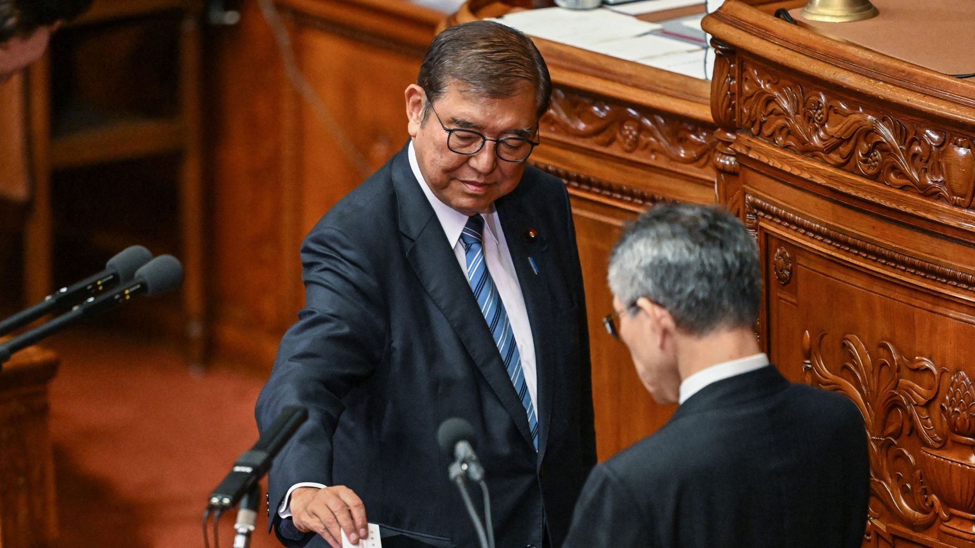 Japanese Prime Minister re-elected as head of minority government