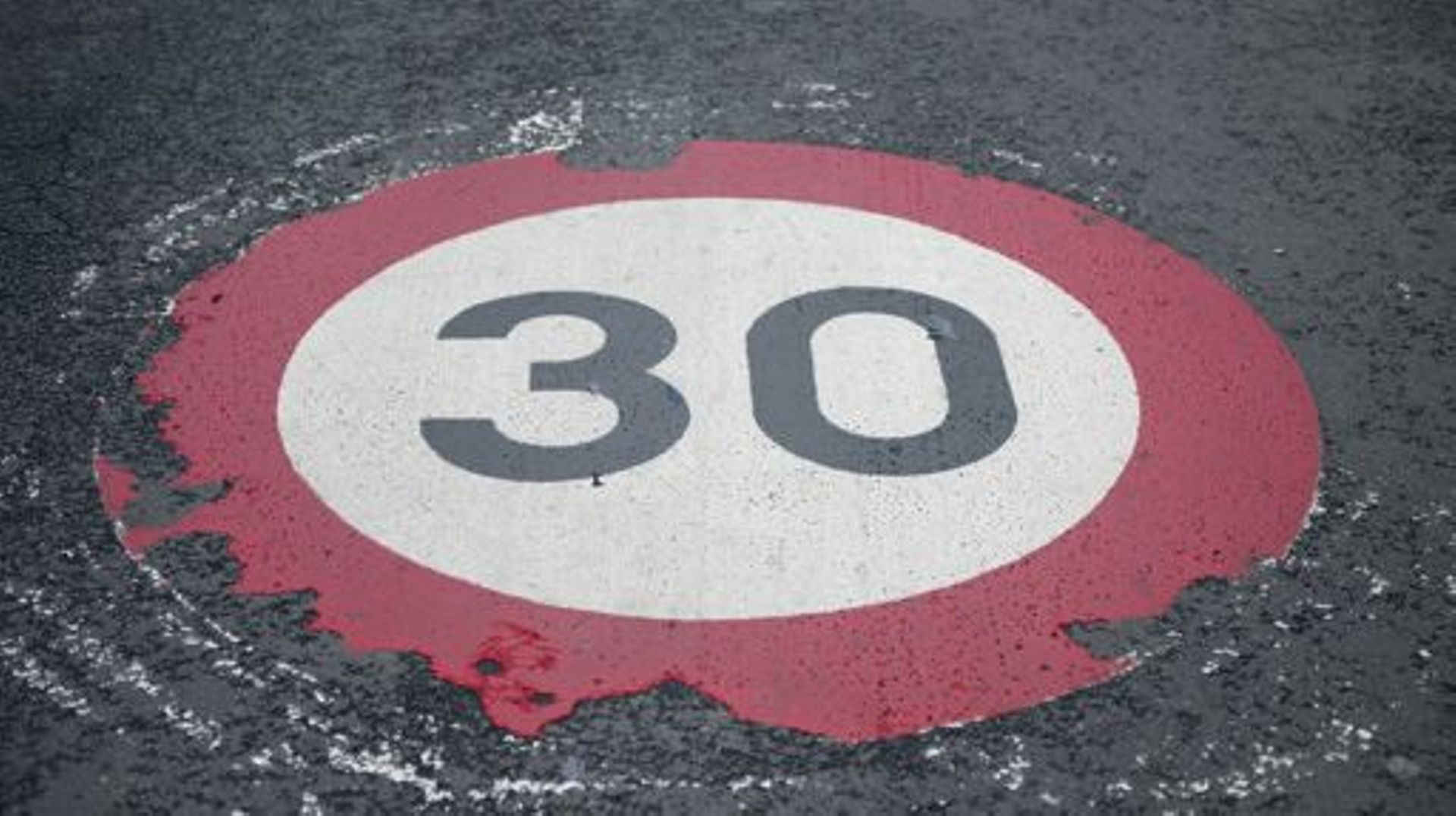 Illustration picture of a Speed Limit Zone 30 sign painted on the ground