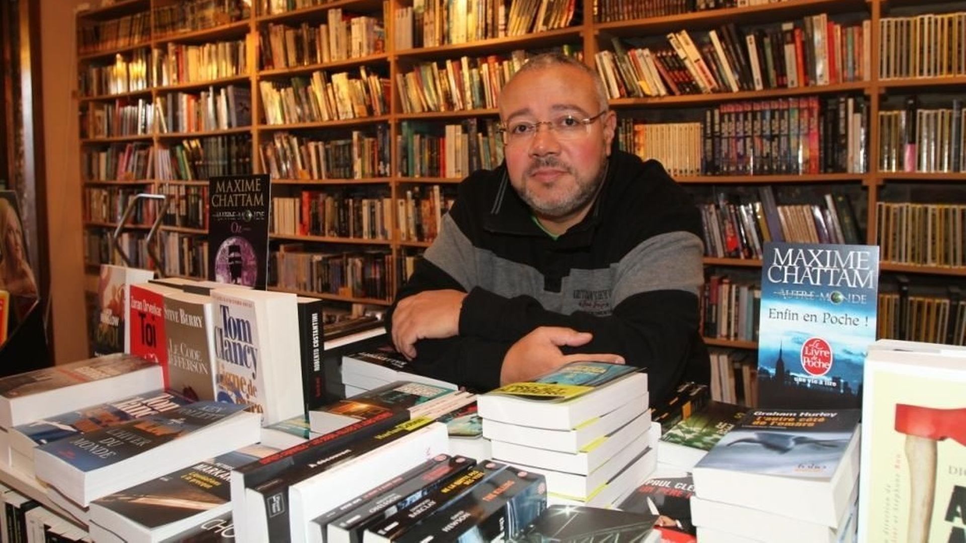 Alain Devalck dans sa librairie
