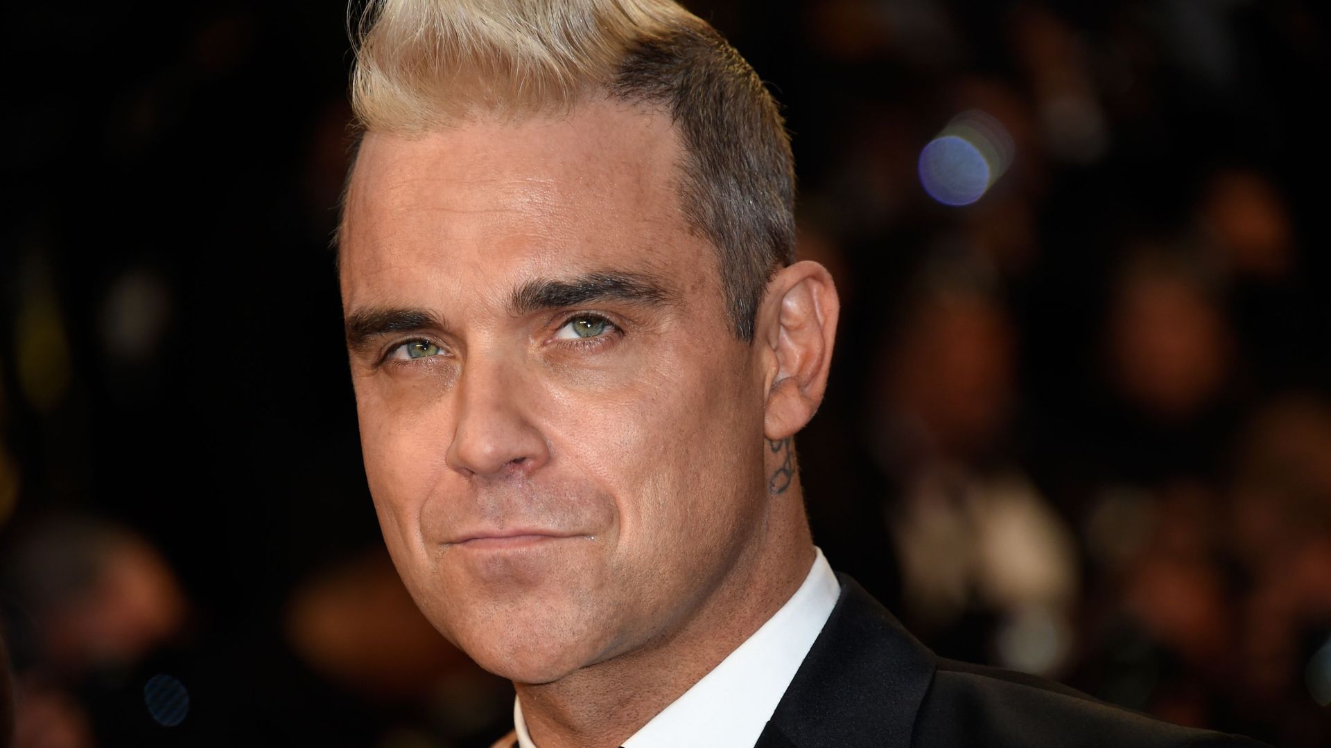 Robbie Williams et Black Eyed Peas au concert de charité de Manchester