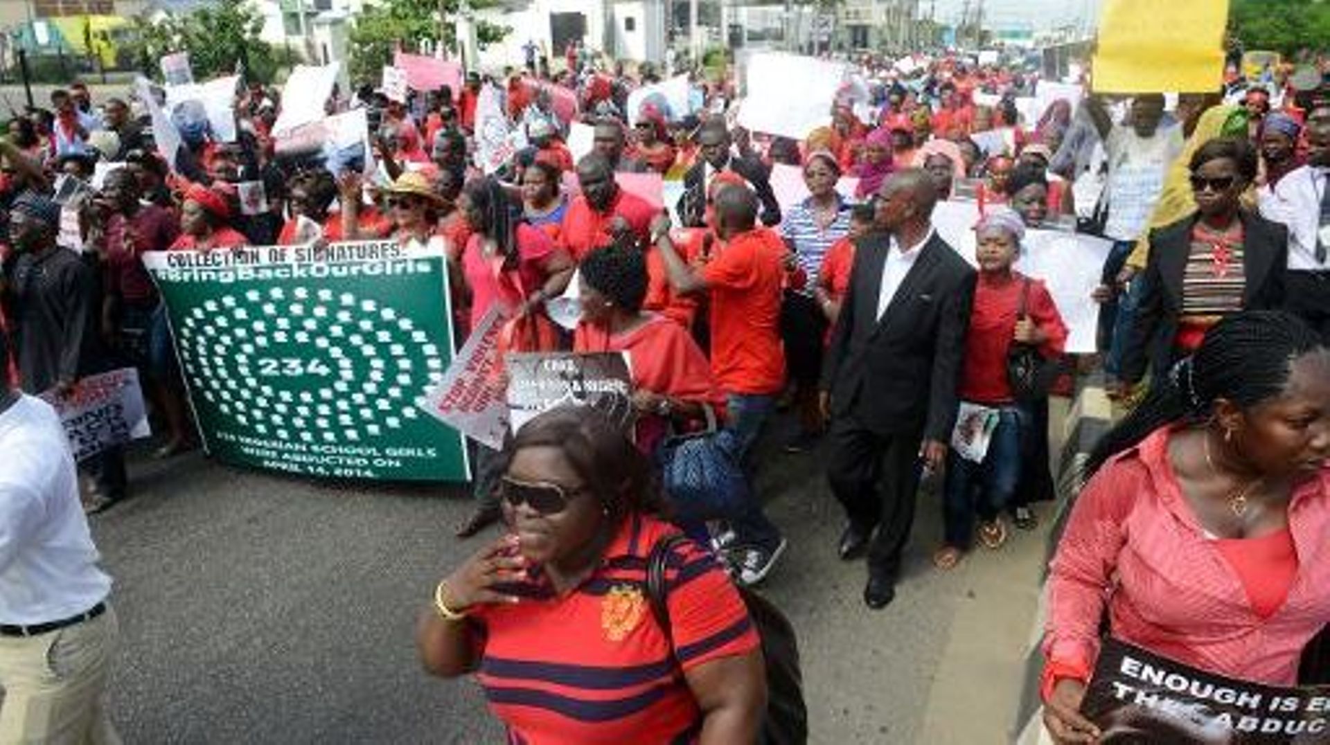 Des personnes manifestent à Lagos le 5 mai 2014 pour la libération des 223 lycéeenes enlevées le 14 avril dans leur établissement scolaire de Chibok, au nord-est du Nigeria
