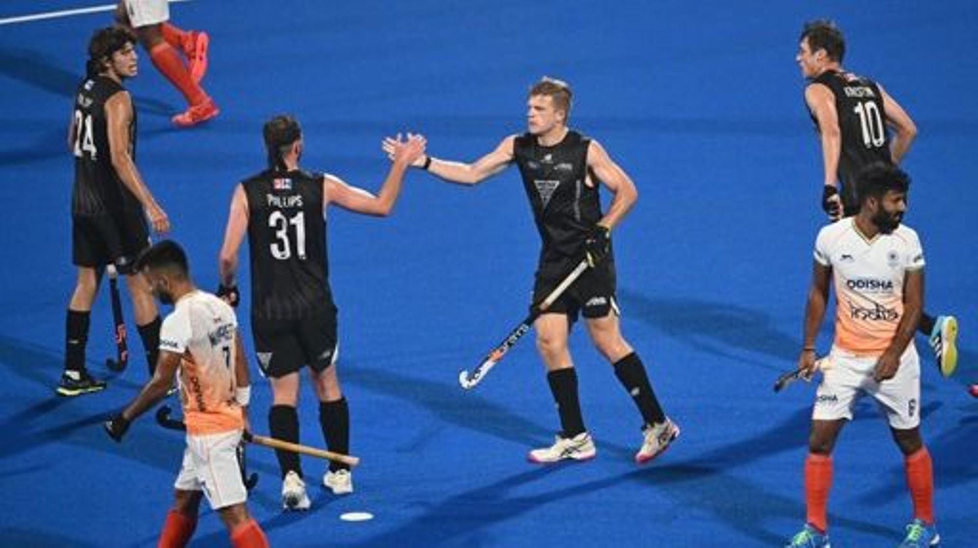 New Zealand’s Sam Lane celebrates after scoring during a game between India and New Zealand, a crossover game at the 2023 Men’s FIH Hockey World Cup in Bhubaneswar, India, Sunday 22 January 2023. BELGA PHOTO DIRK WAEM