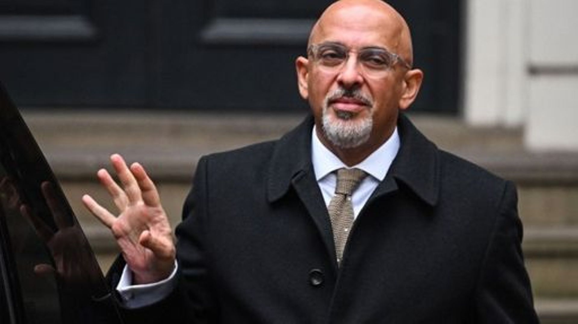 Britain’s Minister without Portfolio and Conservative party chairperson Nadhim Zahawi waves as he leaves the party head office in London, on January 24, 2023. British Prime Minister Rishi Sunak ordered an investigation into wealthy ally Zahawi’s murky tax