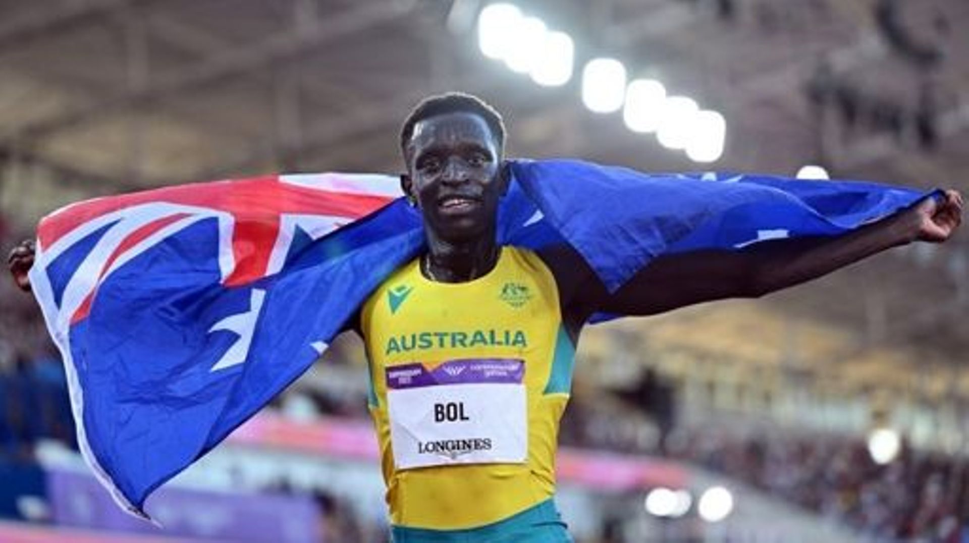 Australia's Peter Bol celebrates second place and taking the silver medal in during the men's 800m final athletics event at the Alexander Stadium, in Birmingham on day ten of the Commonwealth Games in Birmingham, central England, on August 7, 2022.  Glyn 