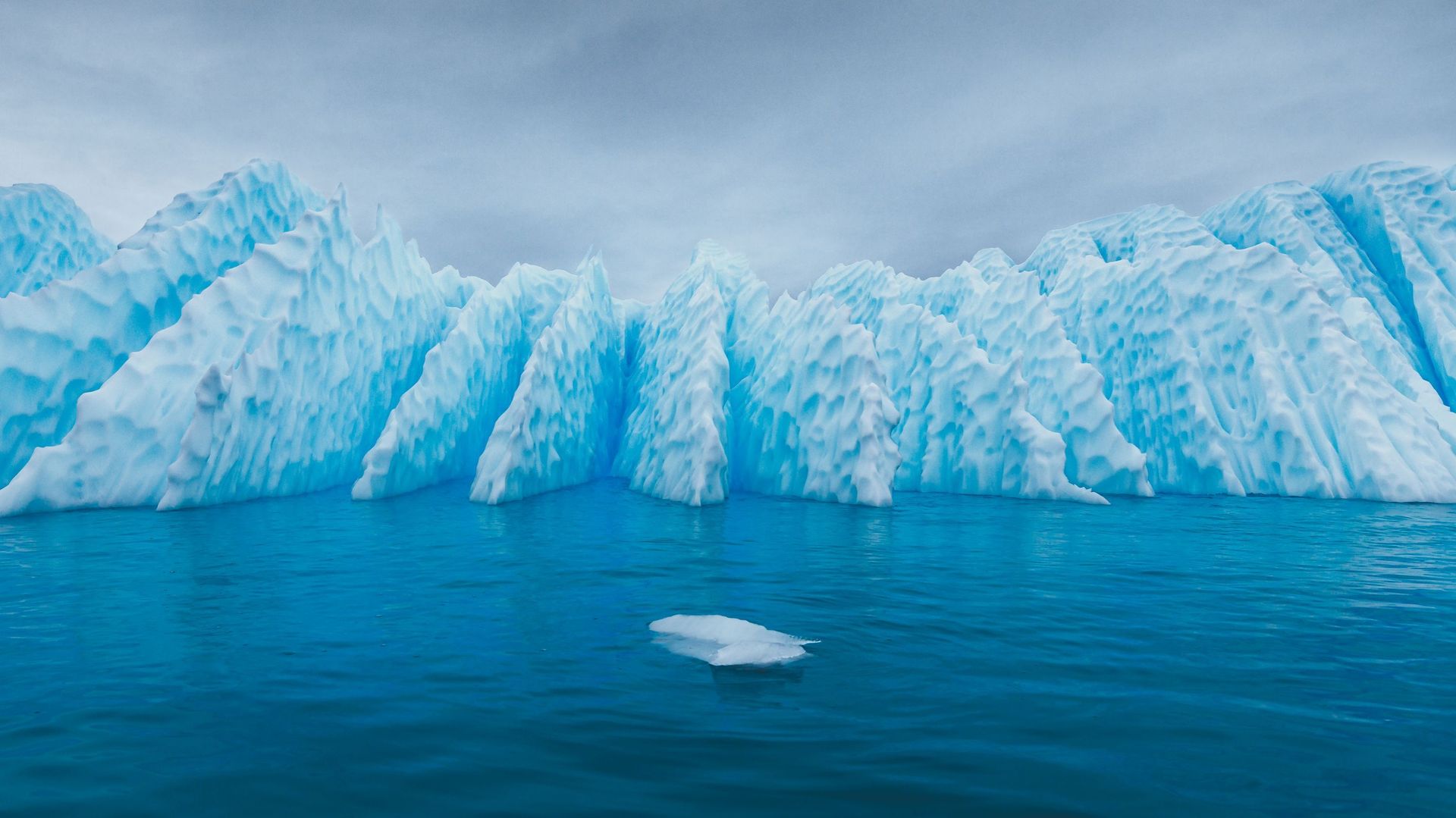 Incrwdkble Blue Iceberg in Antarctica