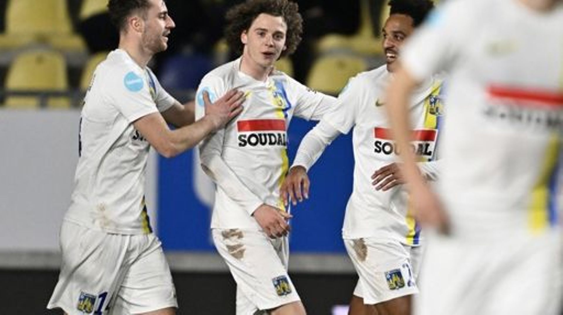 Westerlo’s Kyan Vaesen, Westerlo’s Maxim De Cuyper and Westerlo’s Bryan Reynolds celebrate after scoring during a soccer match between Sint-Truidense VV and KVC Westerlo, Sunday 19 February 2023 in Sint-Truiden, on day 26 of the 2022-2023 'Jupiler Pro Lea