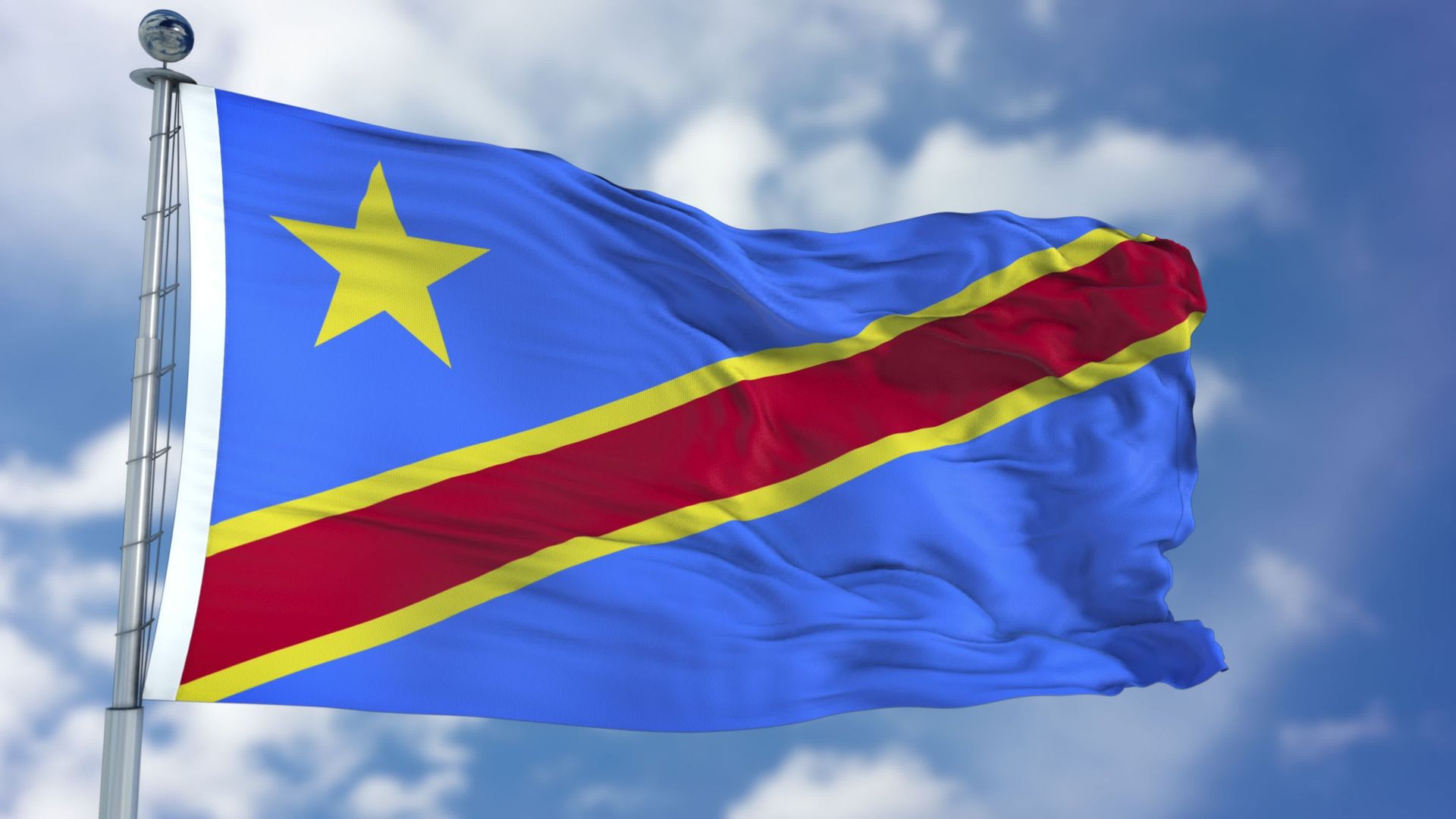 Congo Democratic Republic Flag in a Blue Sky