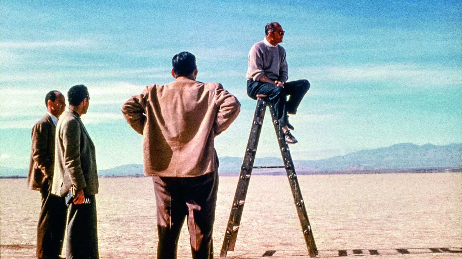 Billy Wilder in the middle of the picture on the ladder