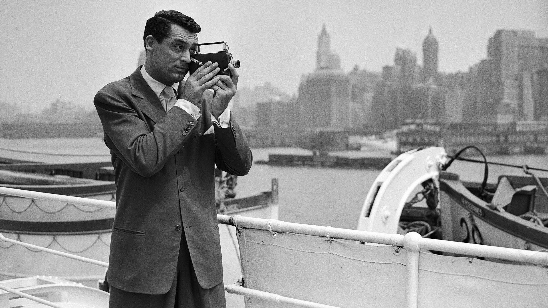 Actor Cary Grant Photographing New York Skyline