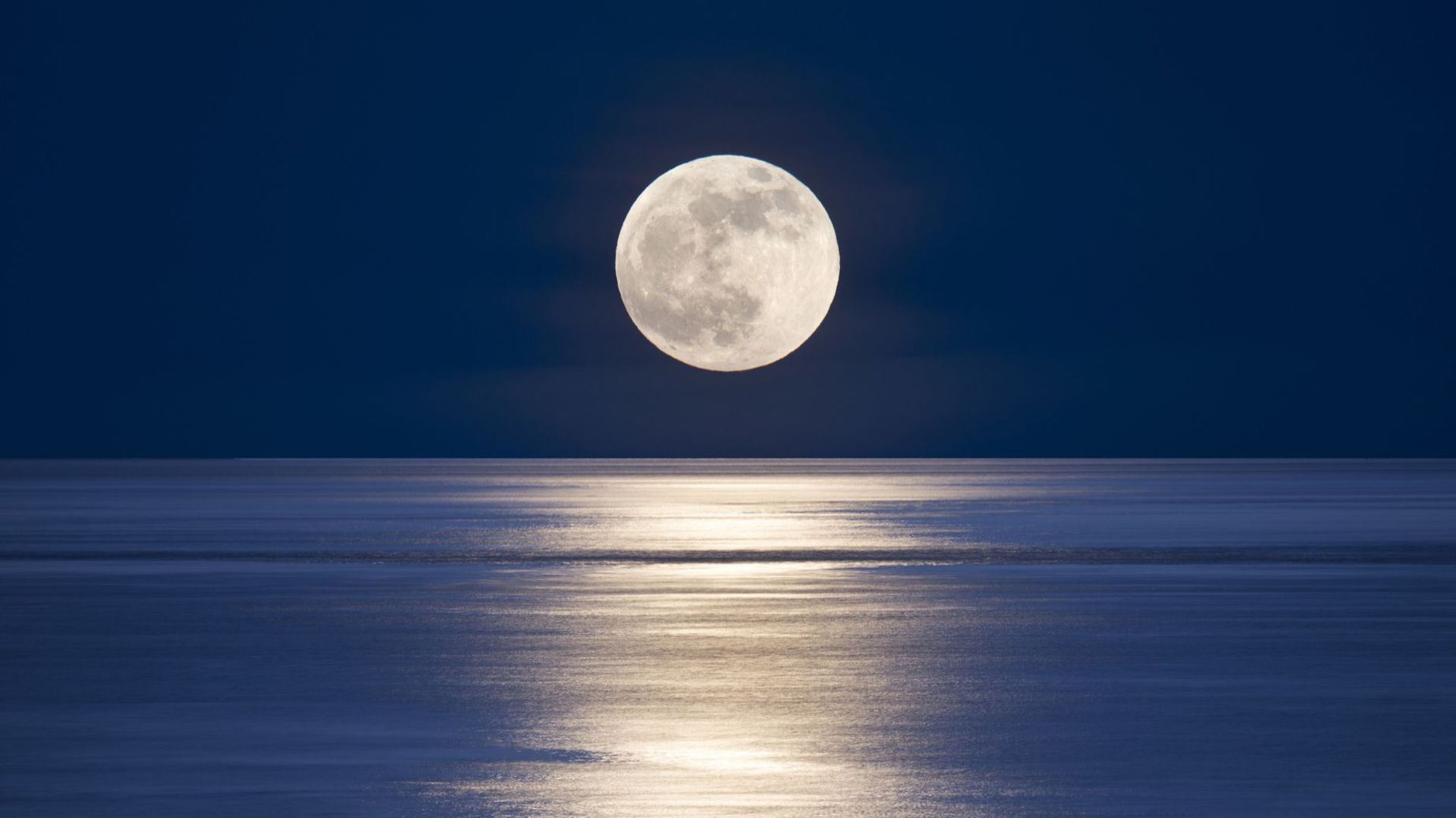 Moonrise over sea.