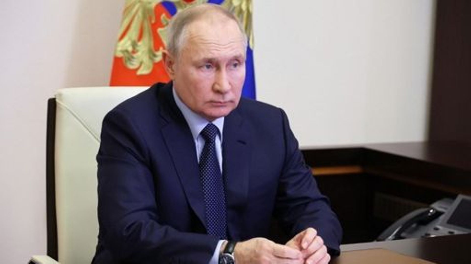 Russian President Vladimir Putin chairs a meeting on the restoration of residential infrastructure in the border areas destroyed during emergency situations, via a video conference at the Novo-Ogaryovo state residence, outside Moscow, on February 1, 2023.