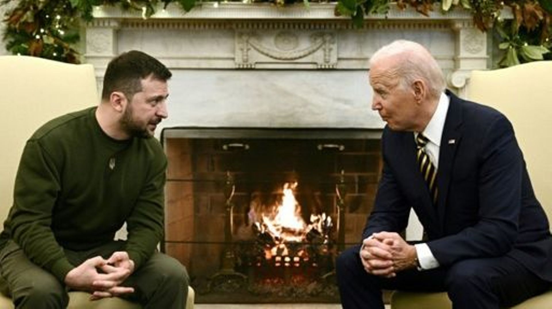 US President Joe Biden and Ukraine's President Volodymyr Zelensky meet in the Oval Office  of the White House, in Washington, DC on December 21, 2022.   Zelensky is in Washington to meet with US President Joe Biden and address Congress -- his first trip a