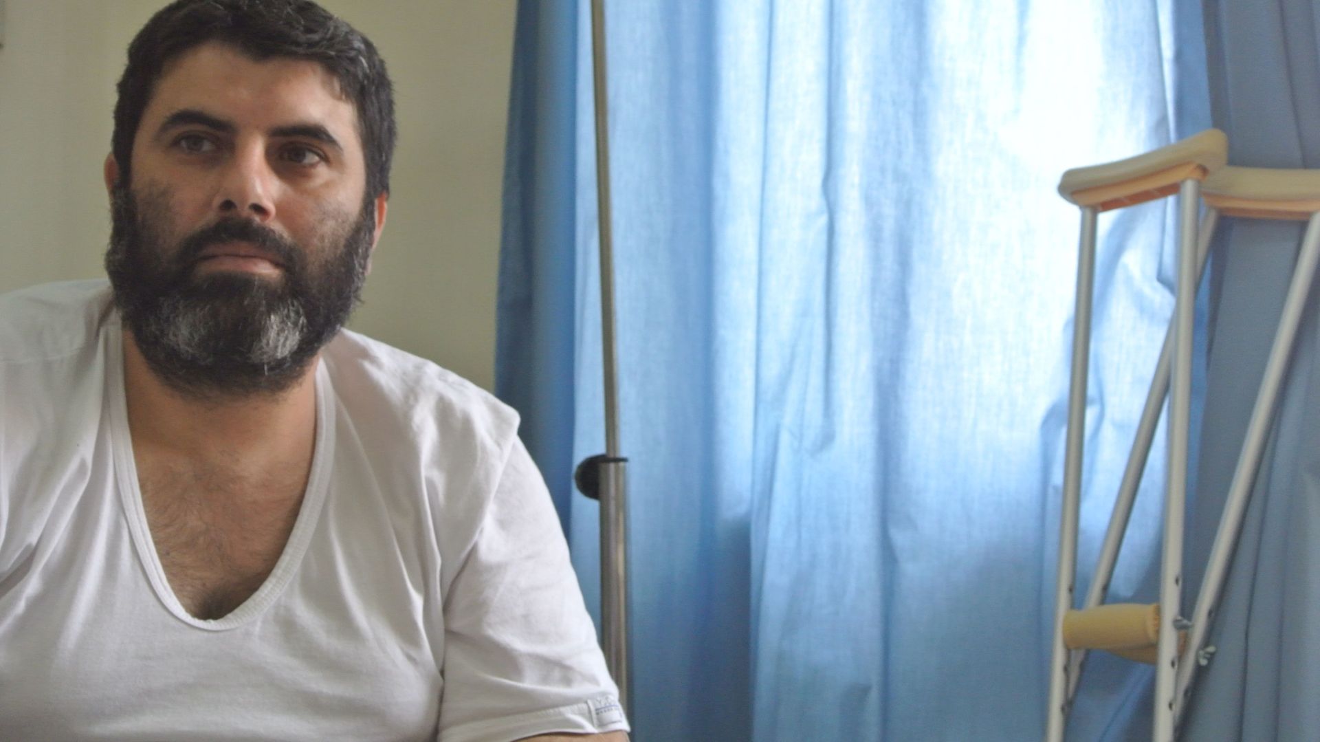 Blessé par un bombardement, cet homme bénéficie de chirurgie reconstructive et d'une aide psychologique dans l’hôpital MSF de Amman.