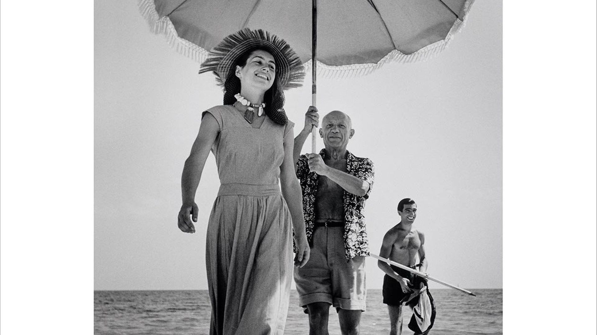 Pablo Picasso with his nephew Javier Vilato and Françoise Gilot on the beach. Golfe-Juan, France. August, 1948.