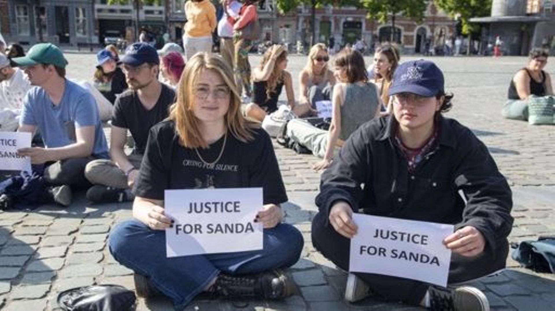 Illustration picture shows a silent protest after Yesterday's judgement of the Antwerp appeal court in the trial against the 18 members of the Reuzegom students club who are associated with the death of Sanda Dia, Saturday 27 May 2023, in Leuven. 20-year-