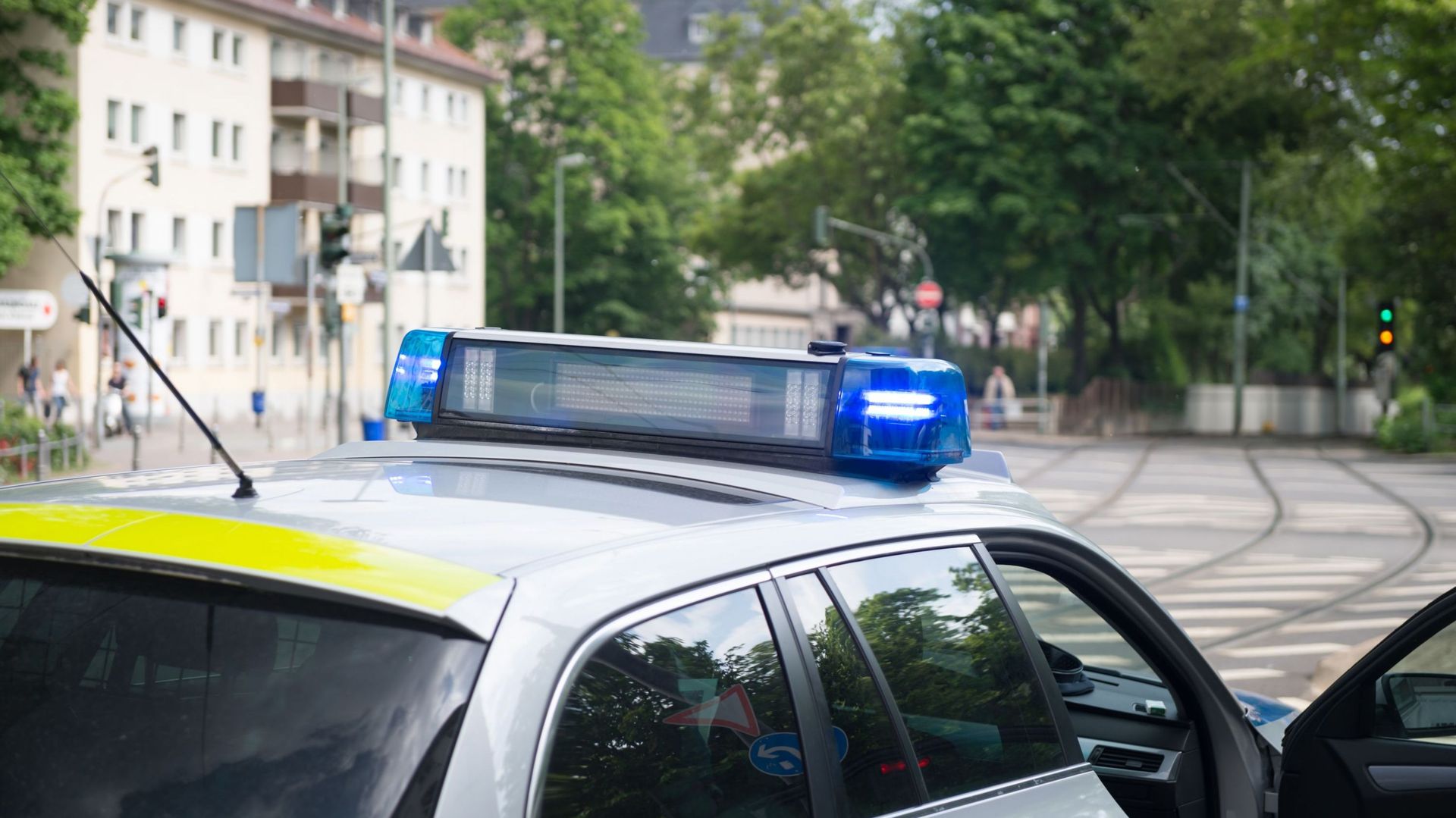 German Polizei police vehicle with siren lights flashing